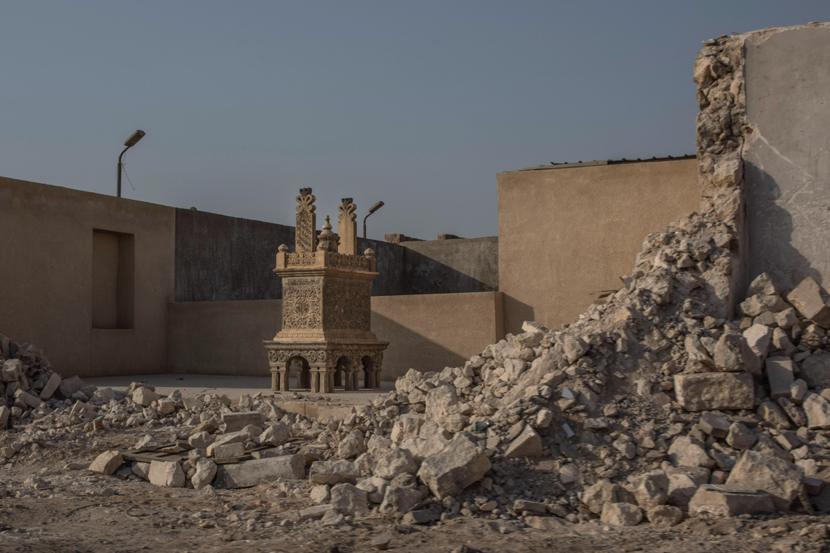 A tomb stands exposed after its walls were knocked down as part of construction of a new highway through the Northern Cemetery, part of the City of the Dead, a UNESCO World Heritage site, in Cairo, Eg