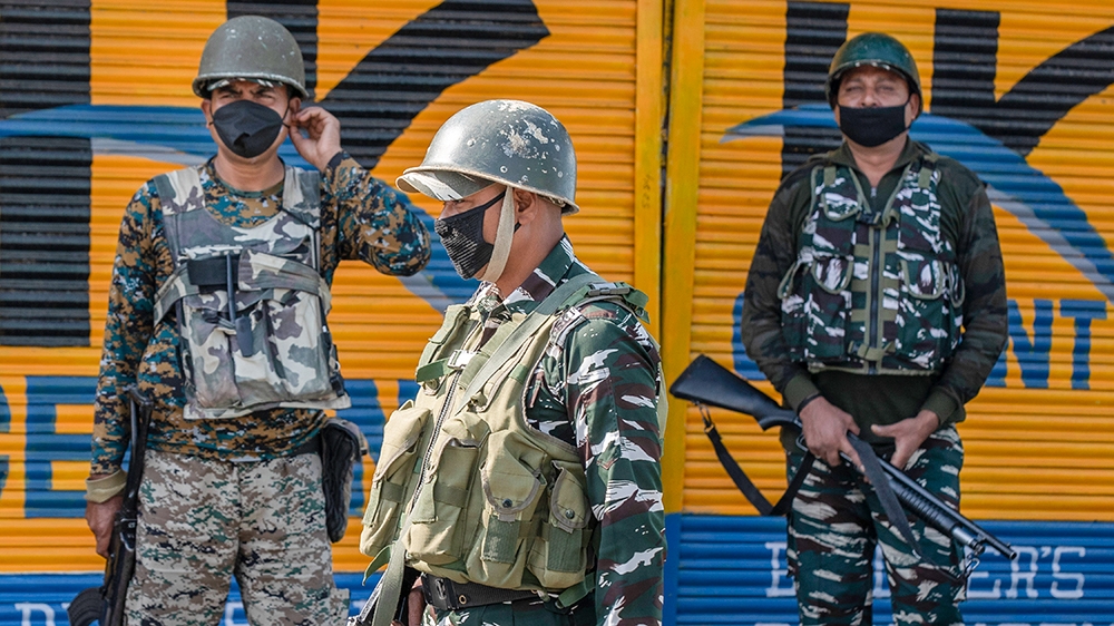 Paramilitary soldiers patrol a deserted street on the first anniversary of India’s decision to revoke the disputed region’s semi-autonomy, in Srinagar, Indian controlled Kashmir, Wednesday, Aug. 5, 20