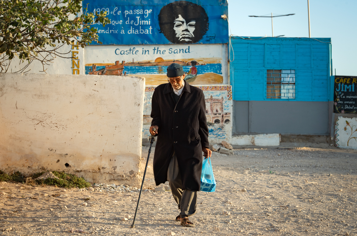 A picture taken in the Moroccan coastal city of Essaouira shows portraits of late US guitarist Jimi Hendrix on September 10, 2020. - Some claim to have seen him, others to have spoken with him -- 50 y