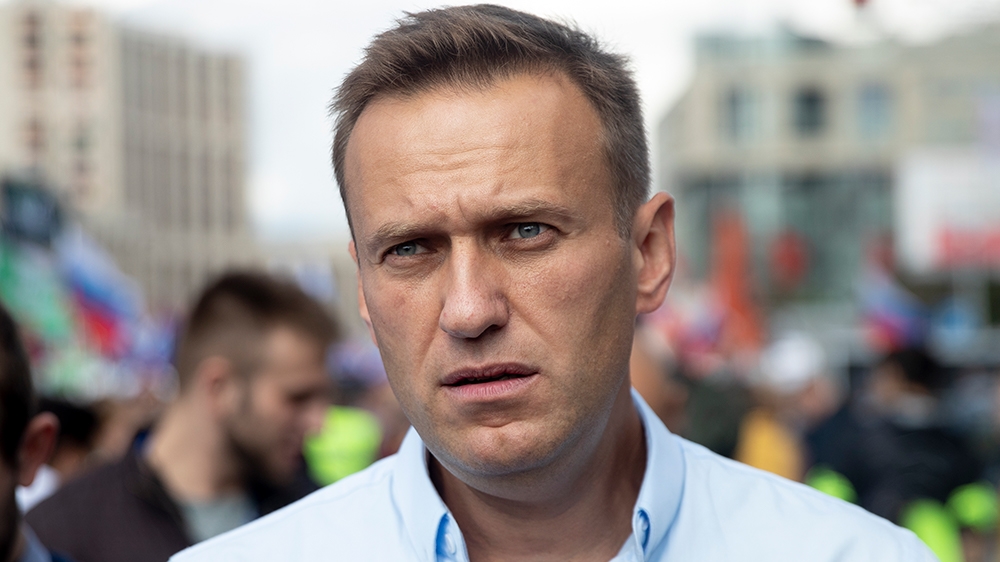 Russian opposition activist Alexei Navalny attends a protest in Moscow, Russia, Saturday, July 20, 2019. Masses of people gathered in central Moscow to demand that opposition candidates be included on