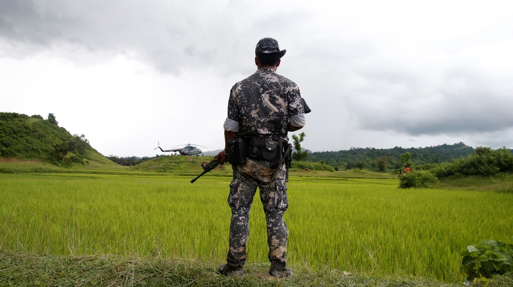 A Myanmar soldier stands near Maungdaw, north of Rakhine state, Myanmar September 27, 2017. REUTERS/Soe Zeya Tun