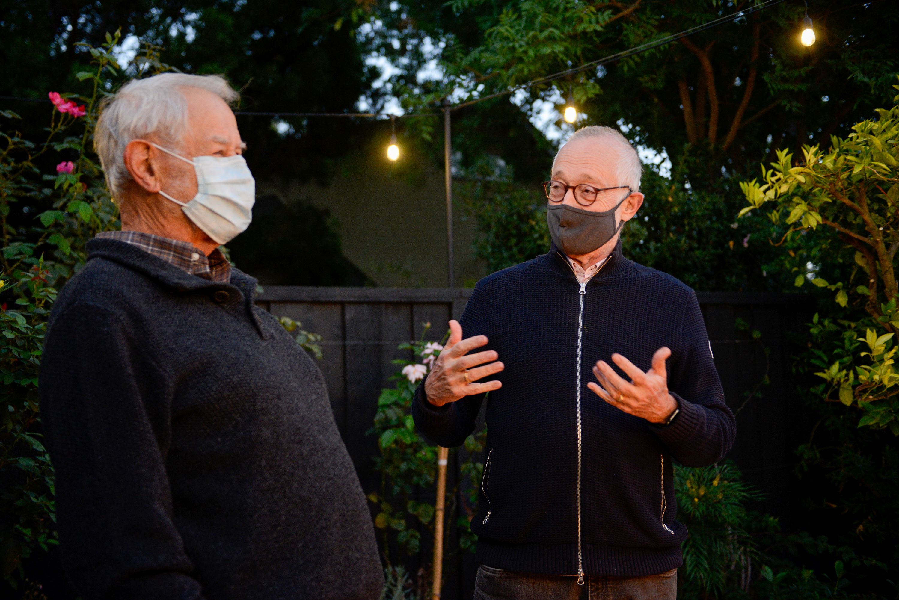 Professors Robert B Wilson and Paul R Milgrom of Stanford University react to winning the 2020 Nobel Prize in Economics, in Stanford, California, US, October 12, 2020 [File: Kate Munsch/Reuters]