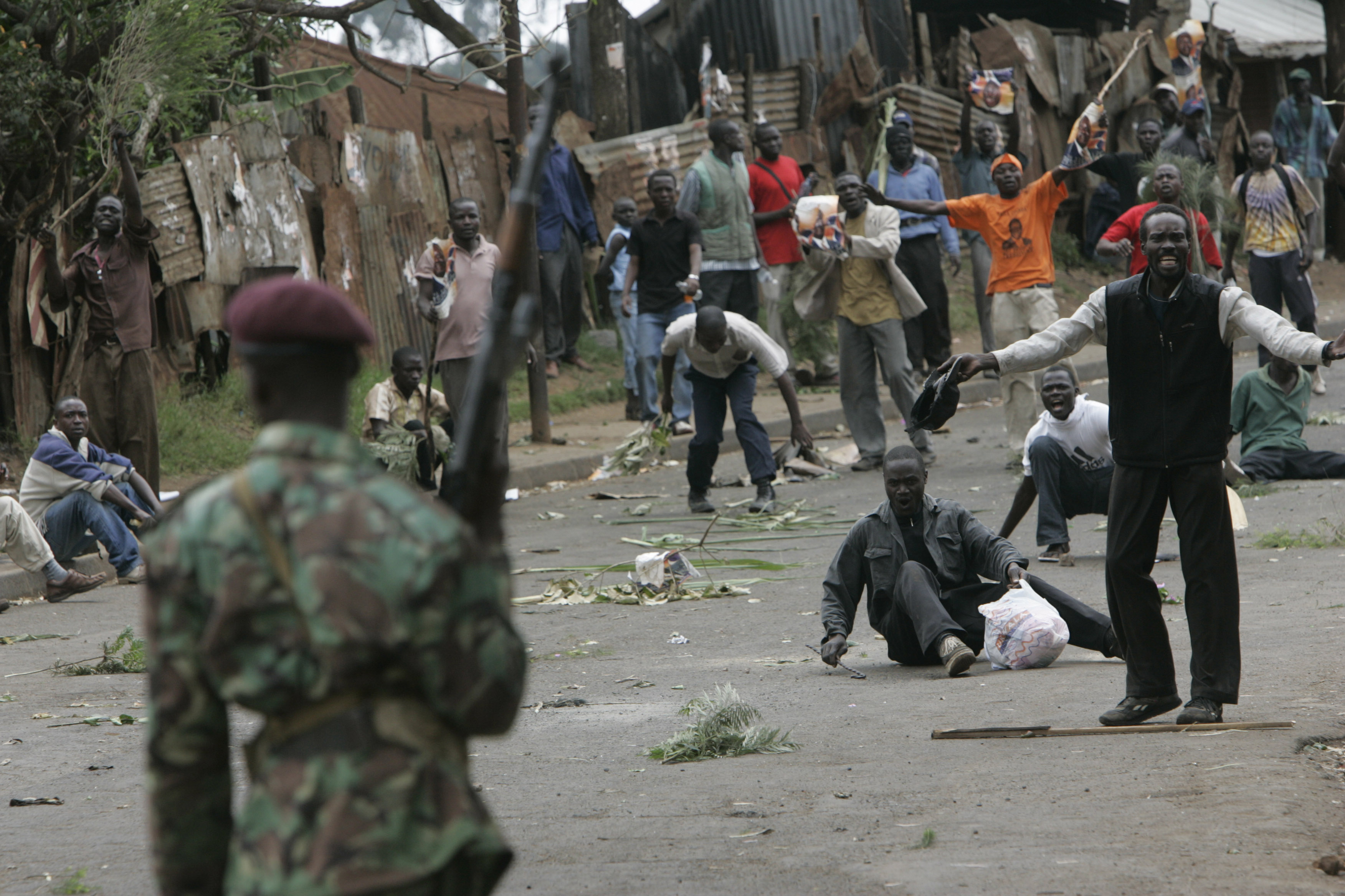 Opposition supporters gather in the streets of the Kibera slum of Nairobi during post-election unrest in Kenya on December 31, 2007 [File: AP/Karel Prinsloo]