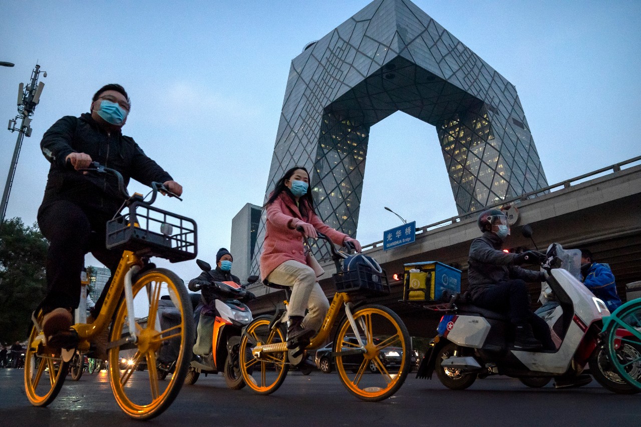 High overseas demand for Chinese electronics and medical equipment, combined with strong domestic consumer spending propelled China's economy to faster-than-expected growth in the fourth quarter of 2020 [File: Mark Schiefelbein/AP Photo]