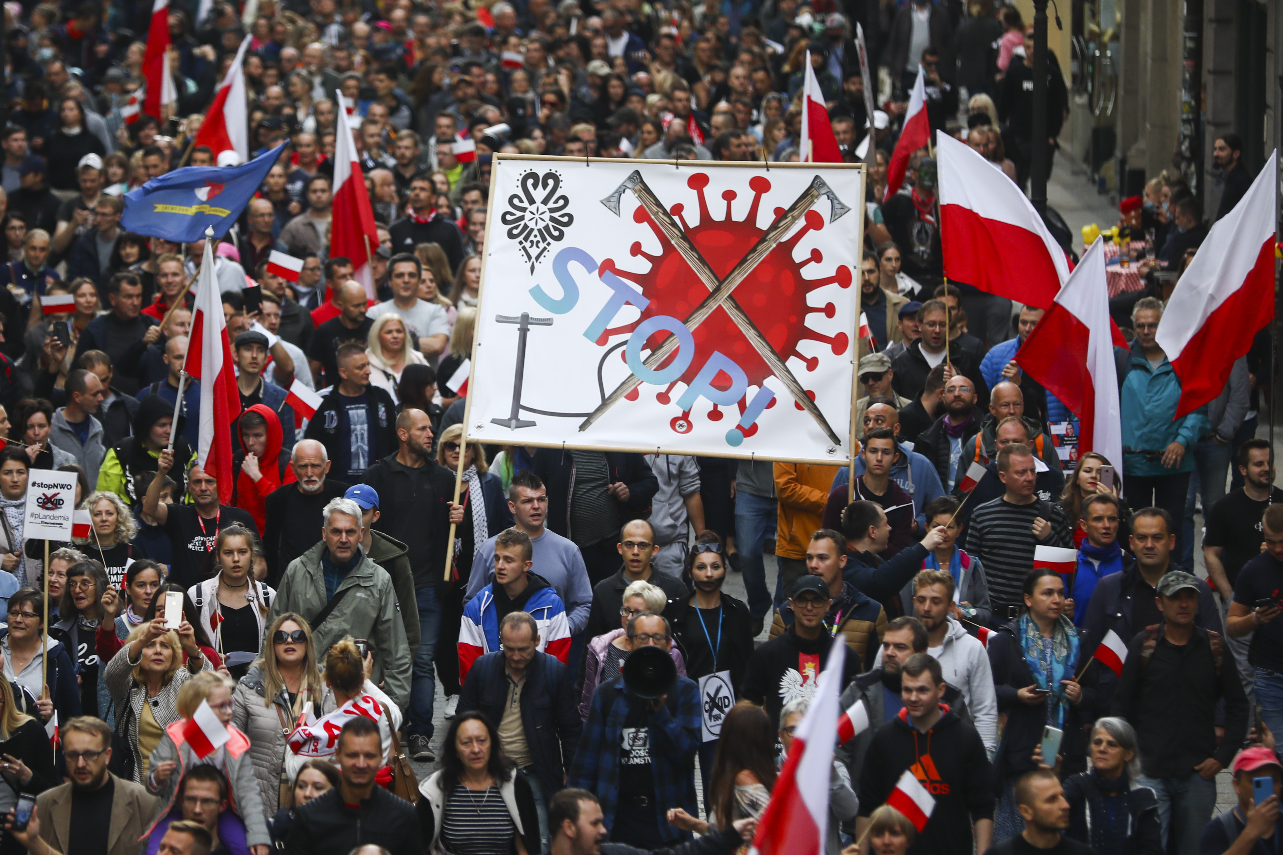 Anti-face mask protesters and coronavirus sceptics attend Anti-COVID Freedom March in Krakow, Poland