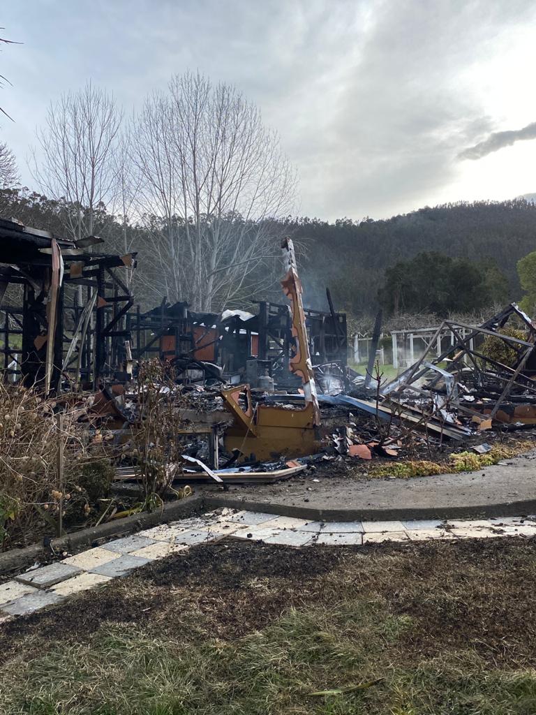 A house belonging to a small land owner that was burned down in Cañete