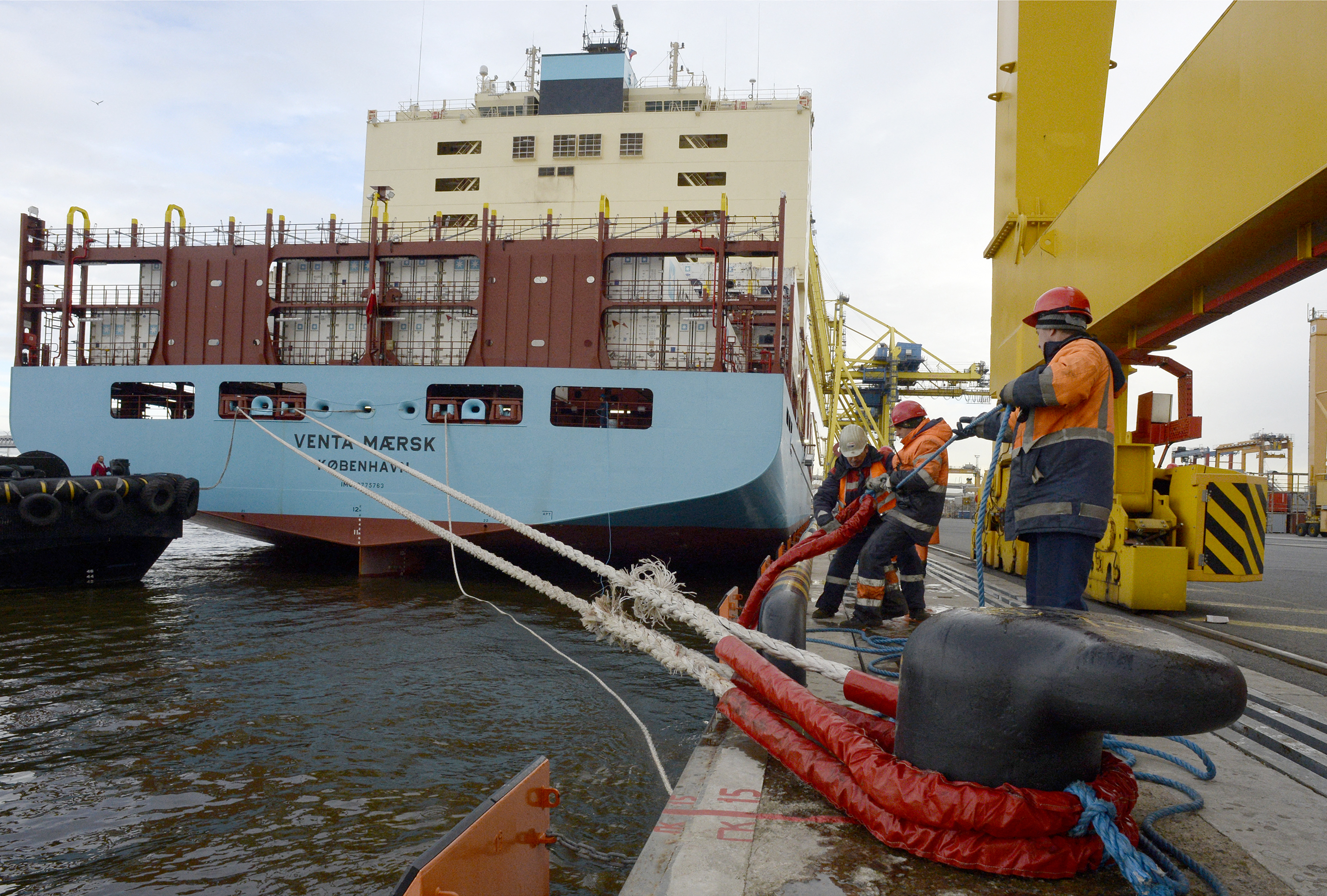 Maersk's new ice-class container vessel, Venta Maersk, is seen docked at the port of St Petersburg after becoming the first container ship to navigate the Russian Arctic [File: Olga Maltseva/AFP]