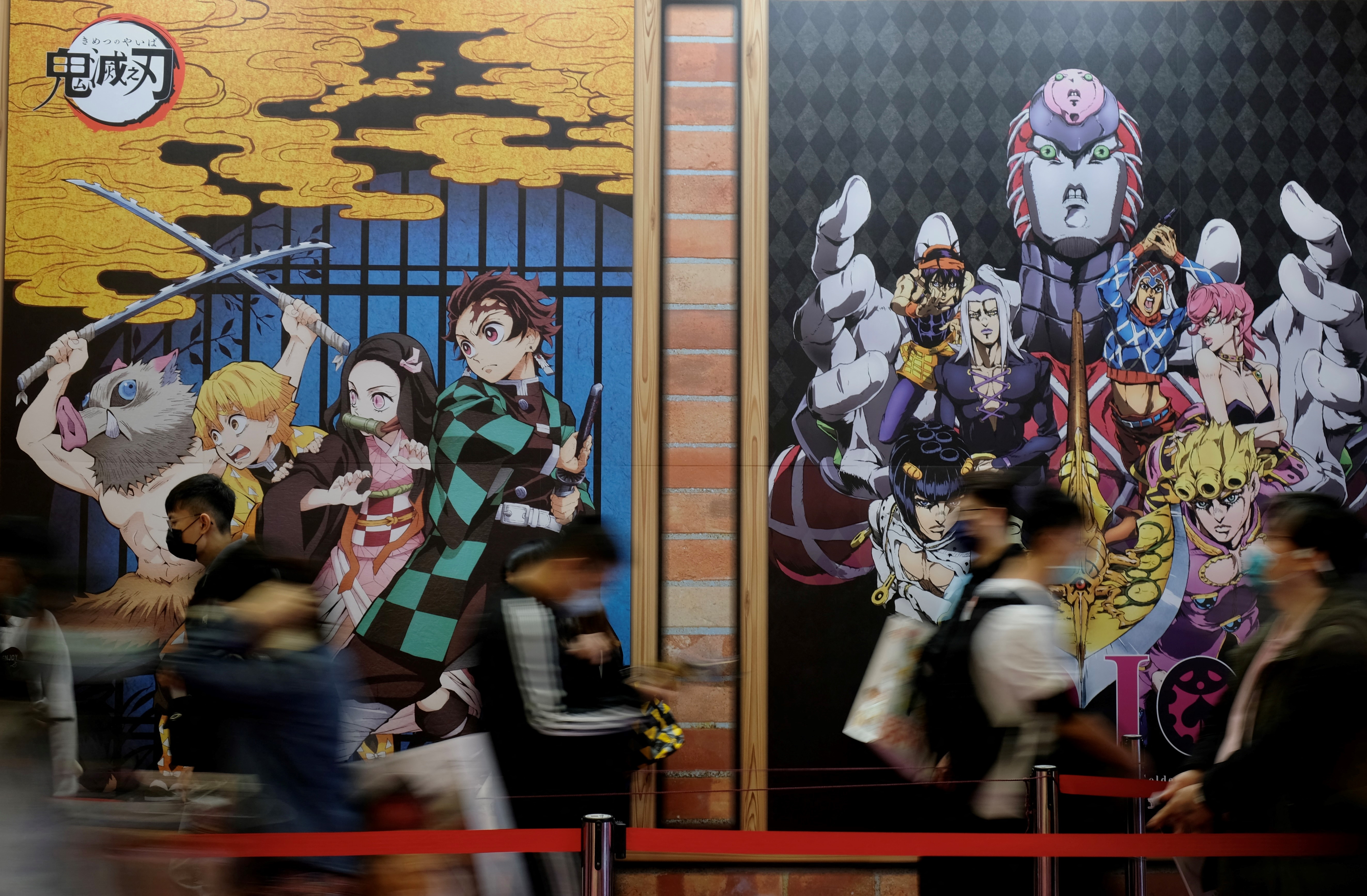 Demon Slayer has built up a loyal following in Asia, and the film version of the manga comic is now wowing US audiences [File: Sam Yeh/AFP]