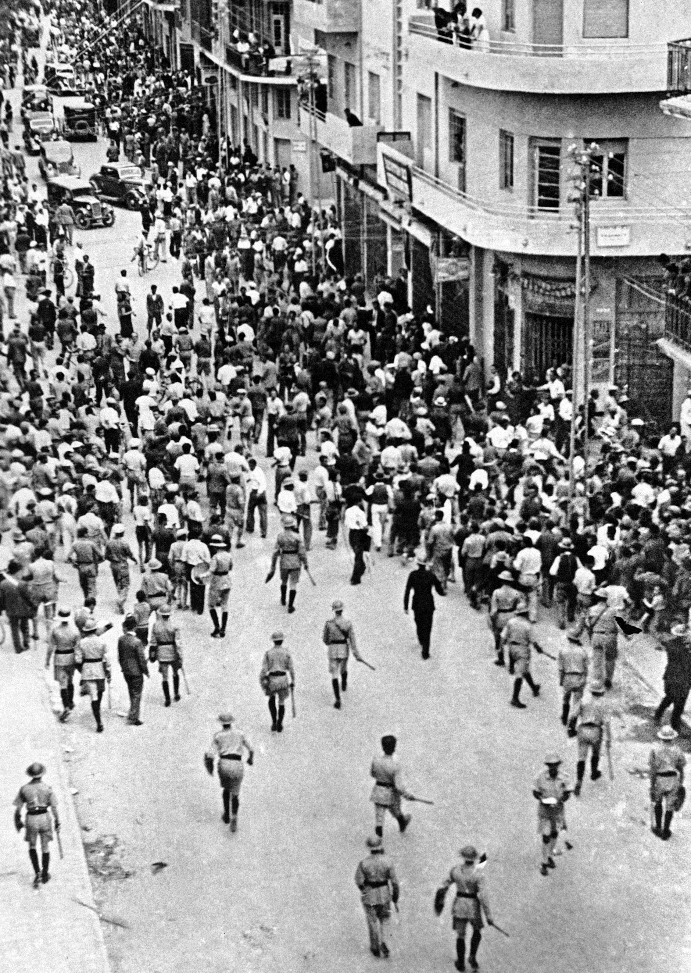 British colonial forces clear the streets in Jaffa on May 1, 1936 during disturbances between Palestinians and Jews, in which several on both sides were killed [File: AP]