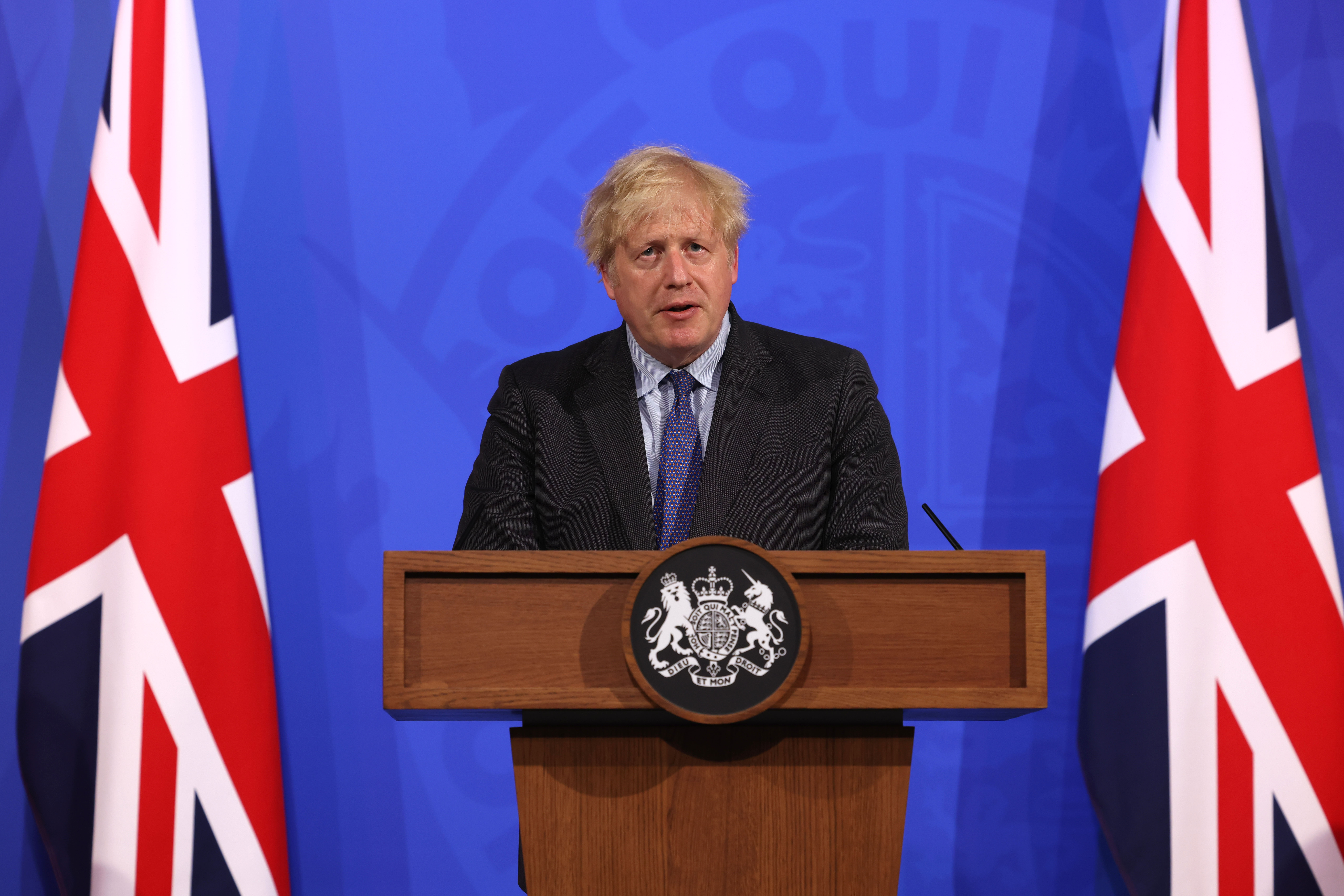 Britain's Prime Minister Boris Johnson speaks during a COVID-19 pandemic virtual press conference inside the Downing Street Briefing Room on June 14, 2021 in London [File: WPA Pool/Getty Images]