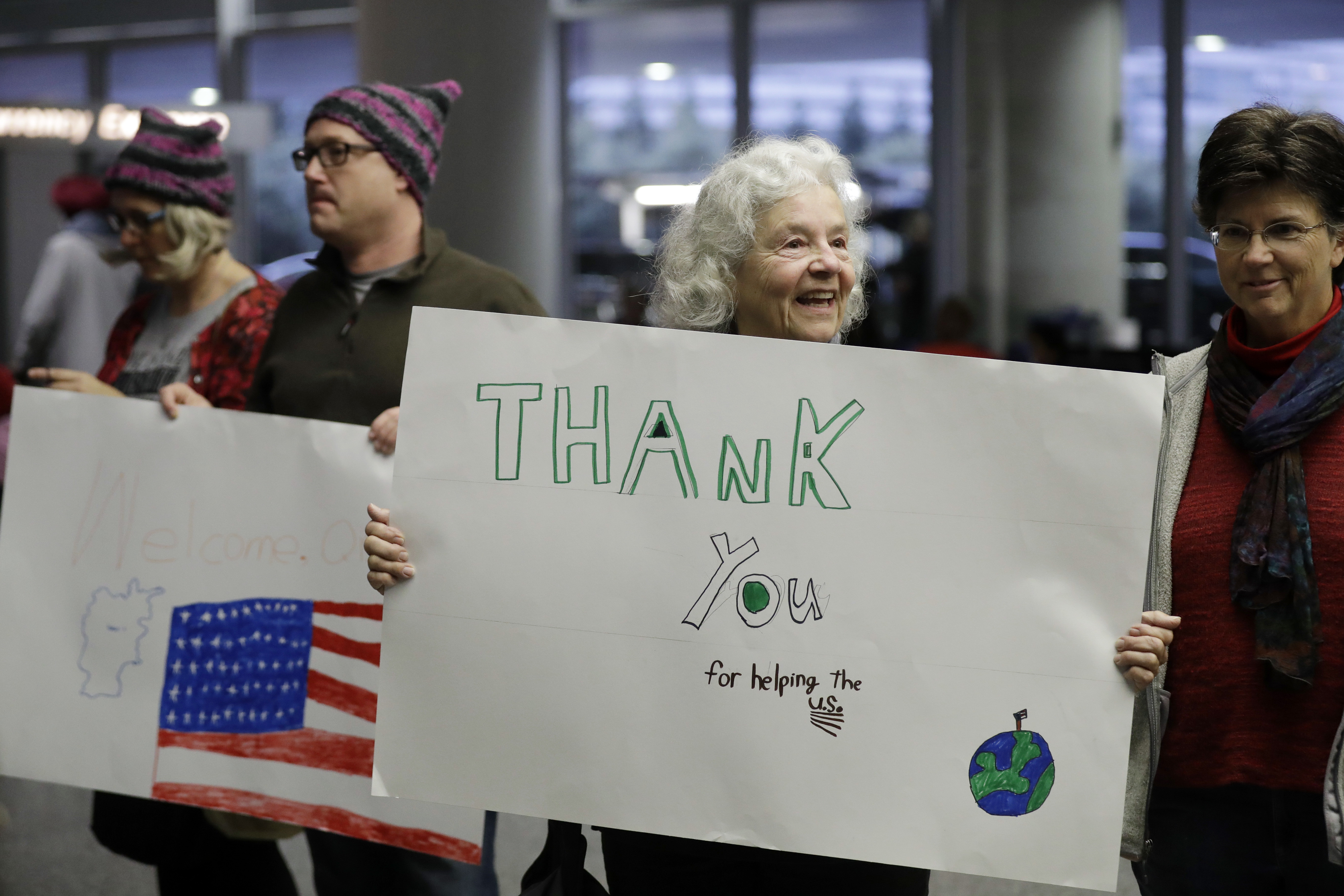 Supporters waiting for an Afghan interpreter to arrive in San Francisco International Airport