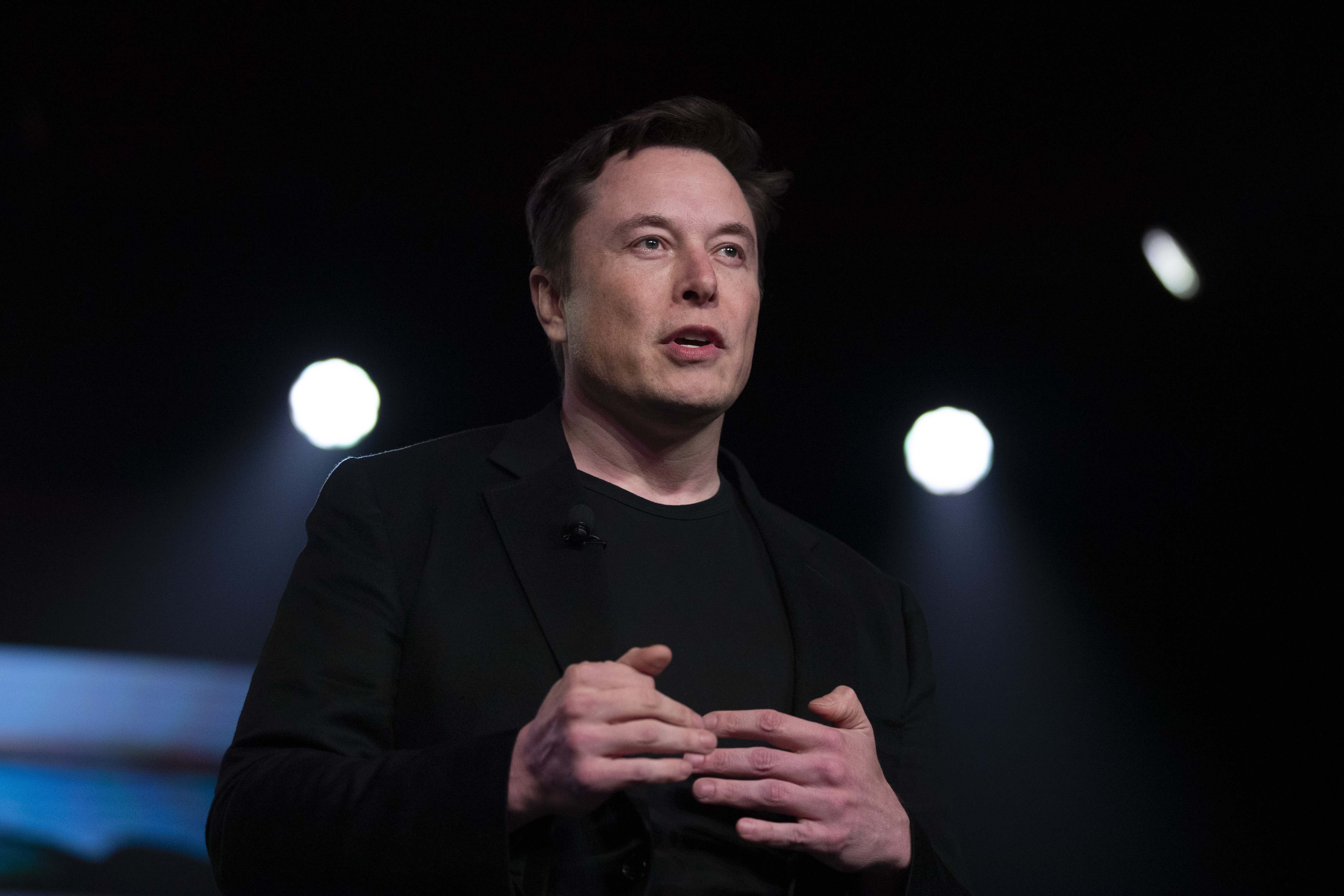 Tesla CEO Elon Musk speaks before unveiling the Model Y