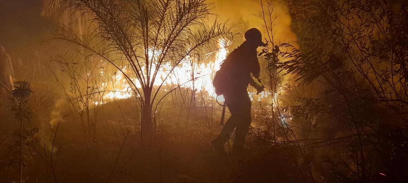 Firefighters tackle a blaze in Avay-Yuty in southern Paraguay [Courtesy of Volunteer Firefighters Yuty]