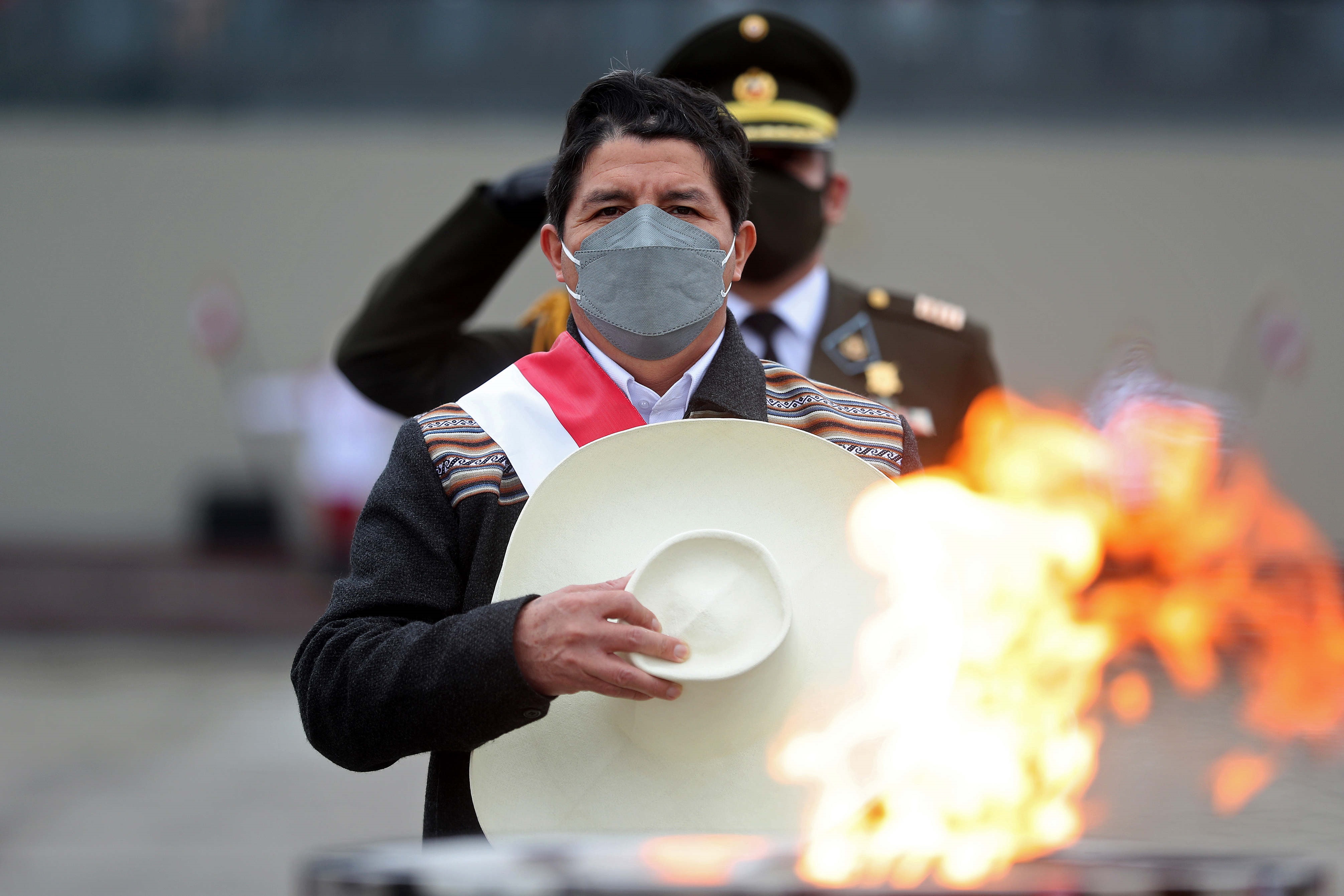 New Peruvian President Pedro Castillo is feeling a lot of heat during his first days in office [Presidency of Peru handout photo via EPA-EFE]