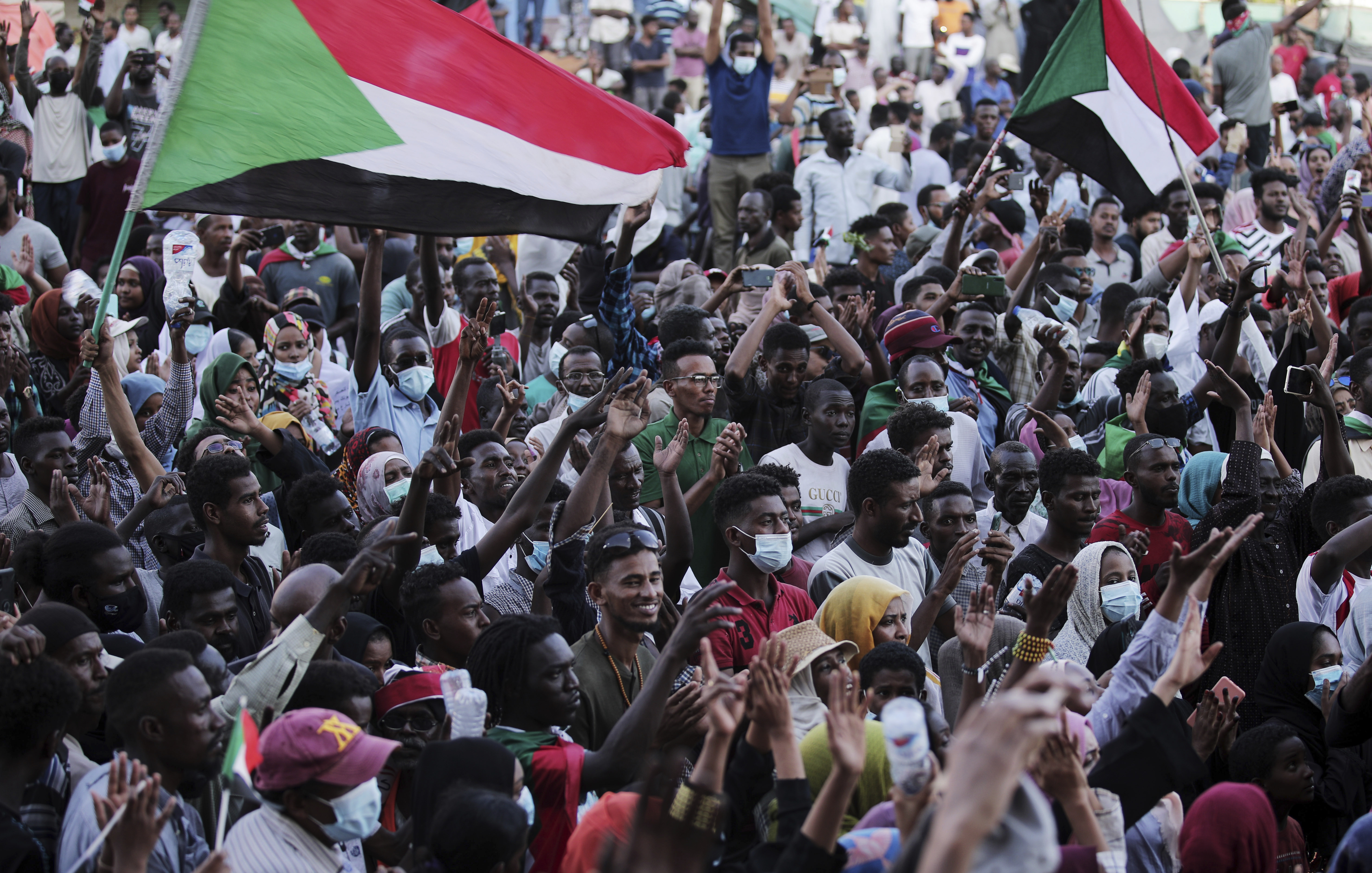 People chant slogans during an anti-coup protest in Khartoum, Sudan on October 30, 2021 [AP/Marwan Ali]