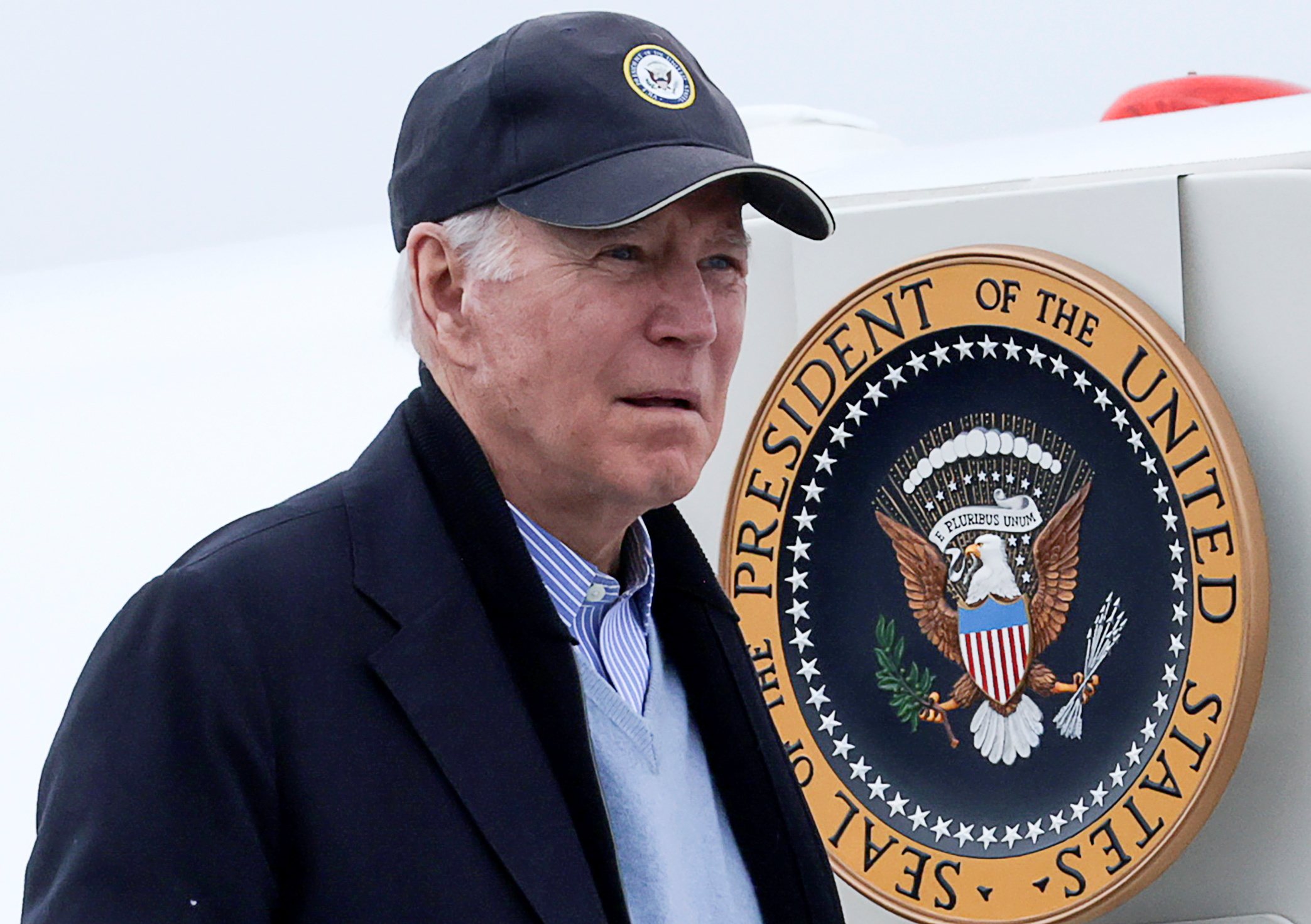 US President Joe Biden boards Air Force One at Nantucket Memorial Airport in Nantucket, Massachusetts