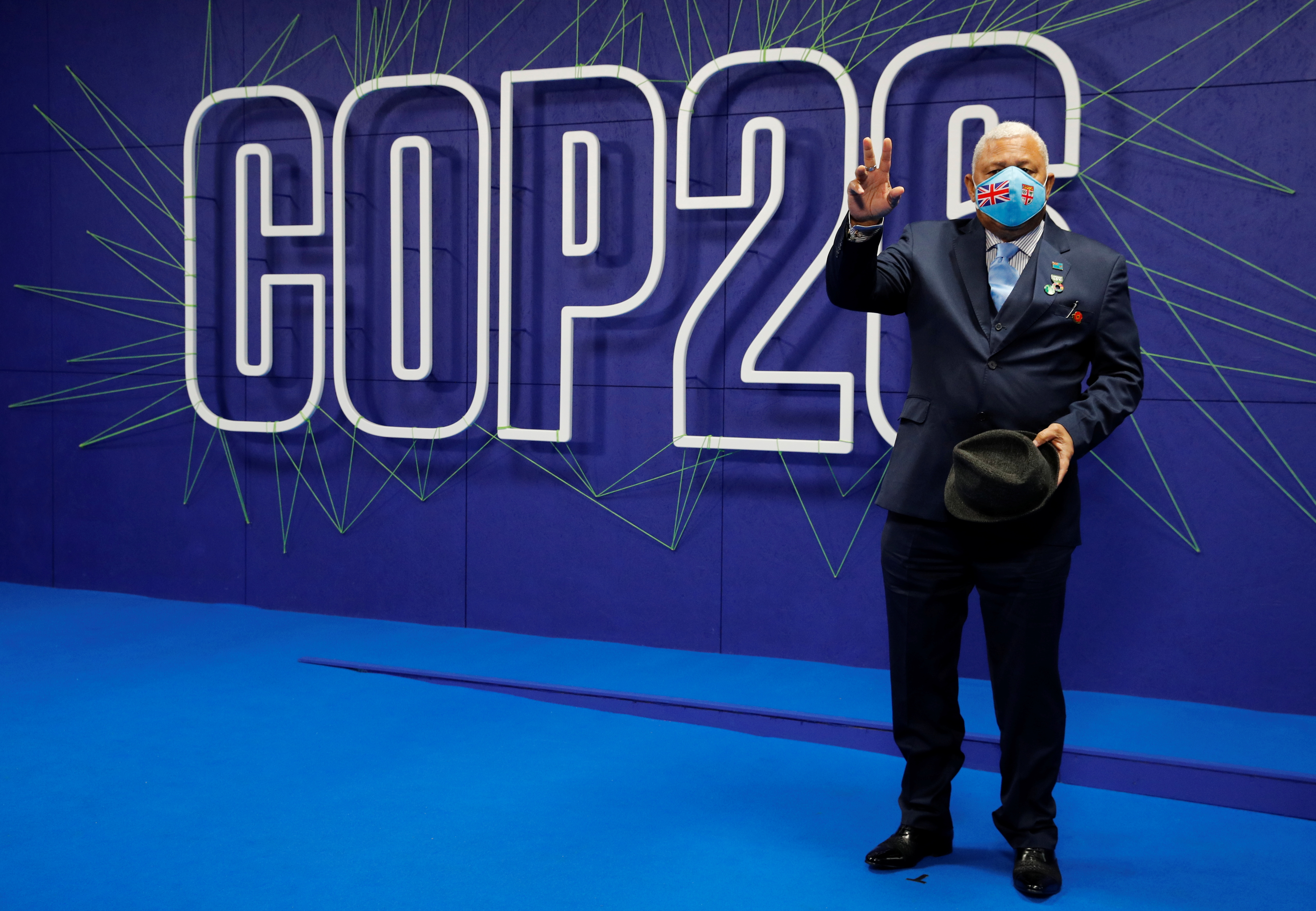 Fiji's Prime Minister Bainimarama arrives for day two of COP26 at SECC on November 1, 2021 in Glasgow, Scotland [Phil Noble - Pool/Getty Images]