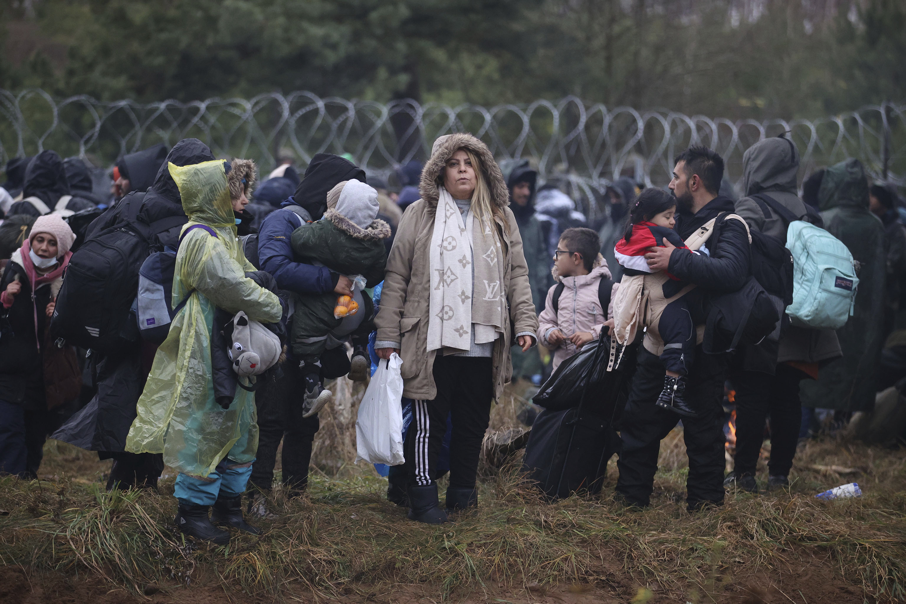 Asylum-seekers gathered last year at the Belarus-Poland border near Grodno, Belarus