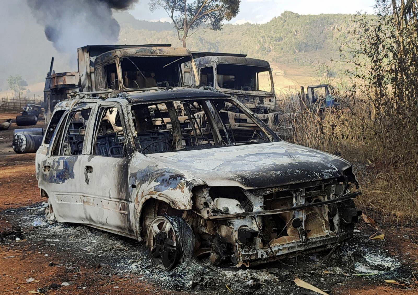 Smoke and flames billow from vehicles in Hpruso township, Kayah state, Myanmar