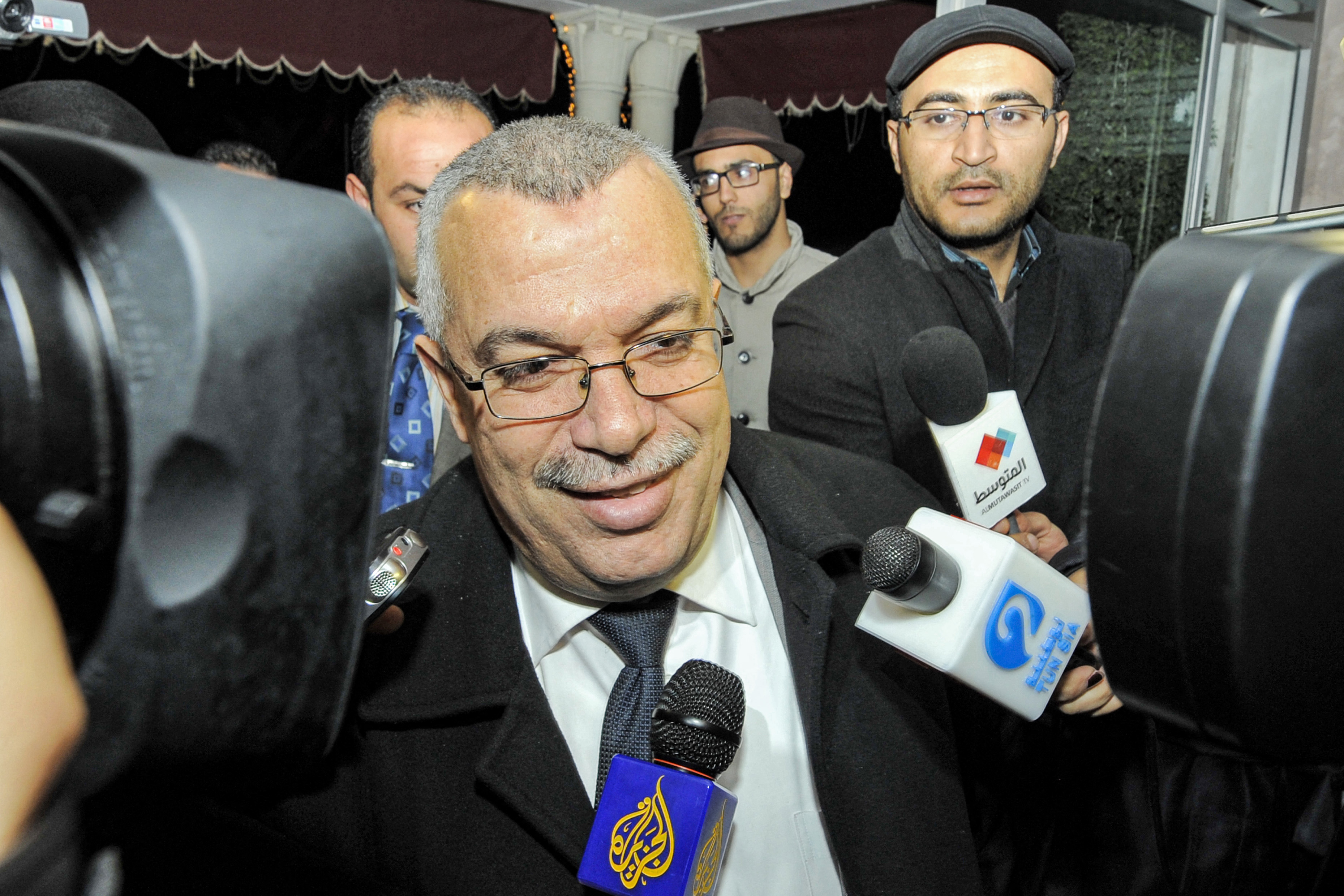 Tunisian justice minister Noureddine Bhiri speaks to journalists.