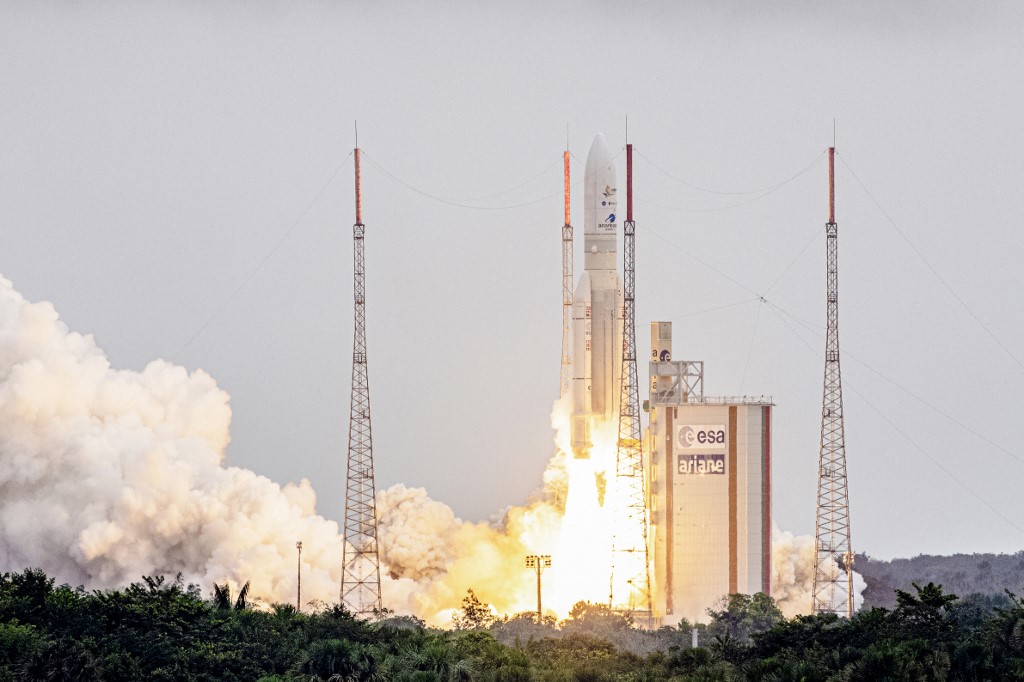 Arianespace's Ariane 5 rocket lifting up from the launchpad