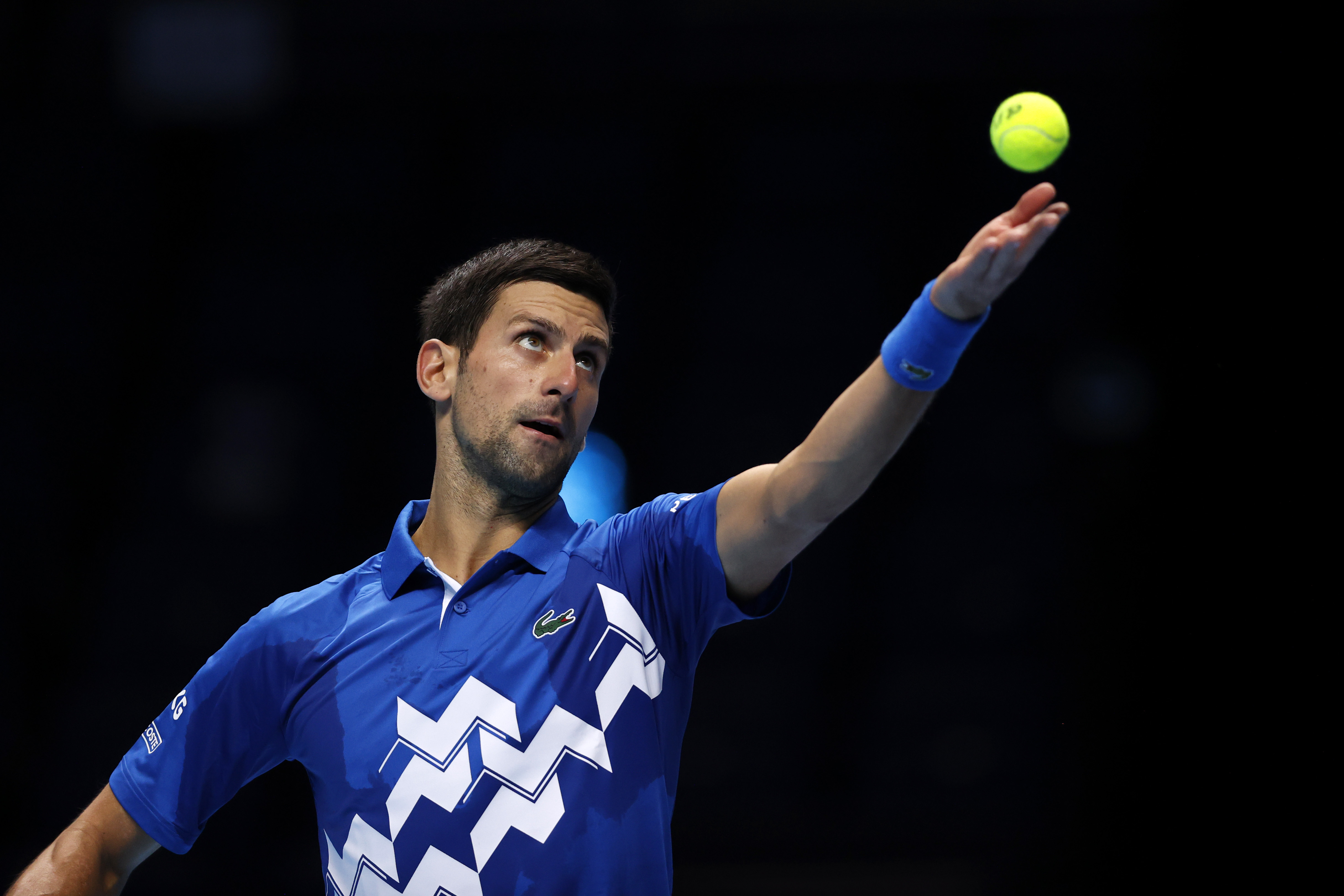 Novak Djokovic of Serbia serves during a singles semi final match.