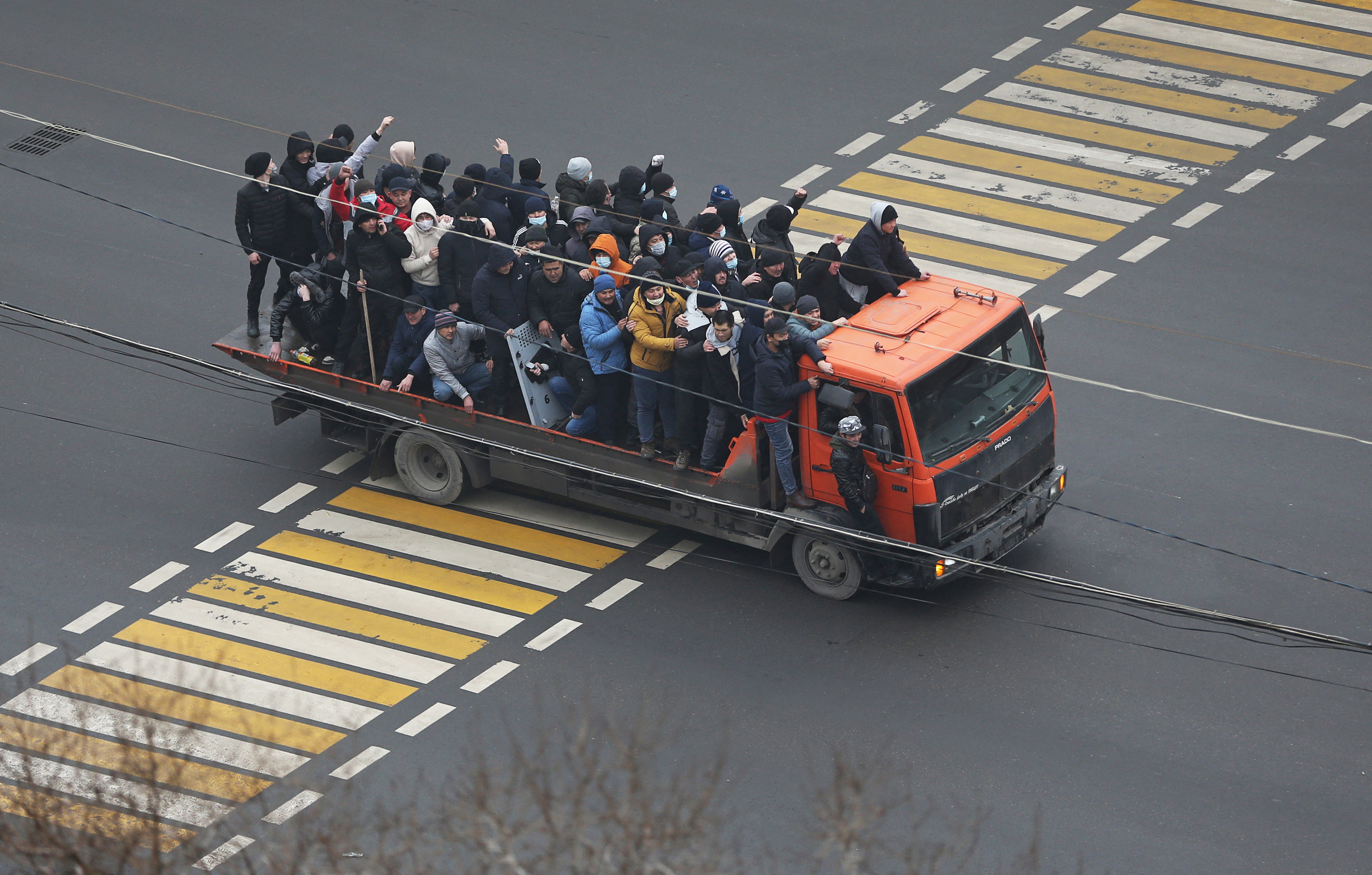 Demonstrators take part in a protest triggered by fuel price increase in Almaty, Kazakhstan