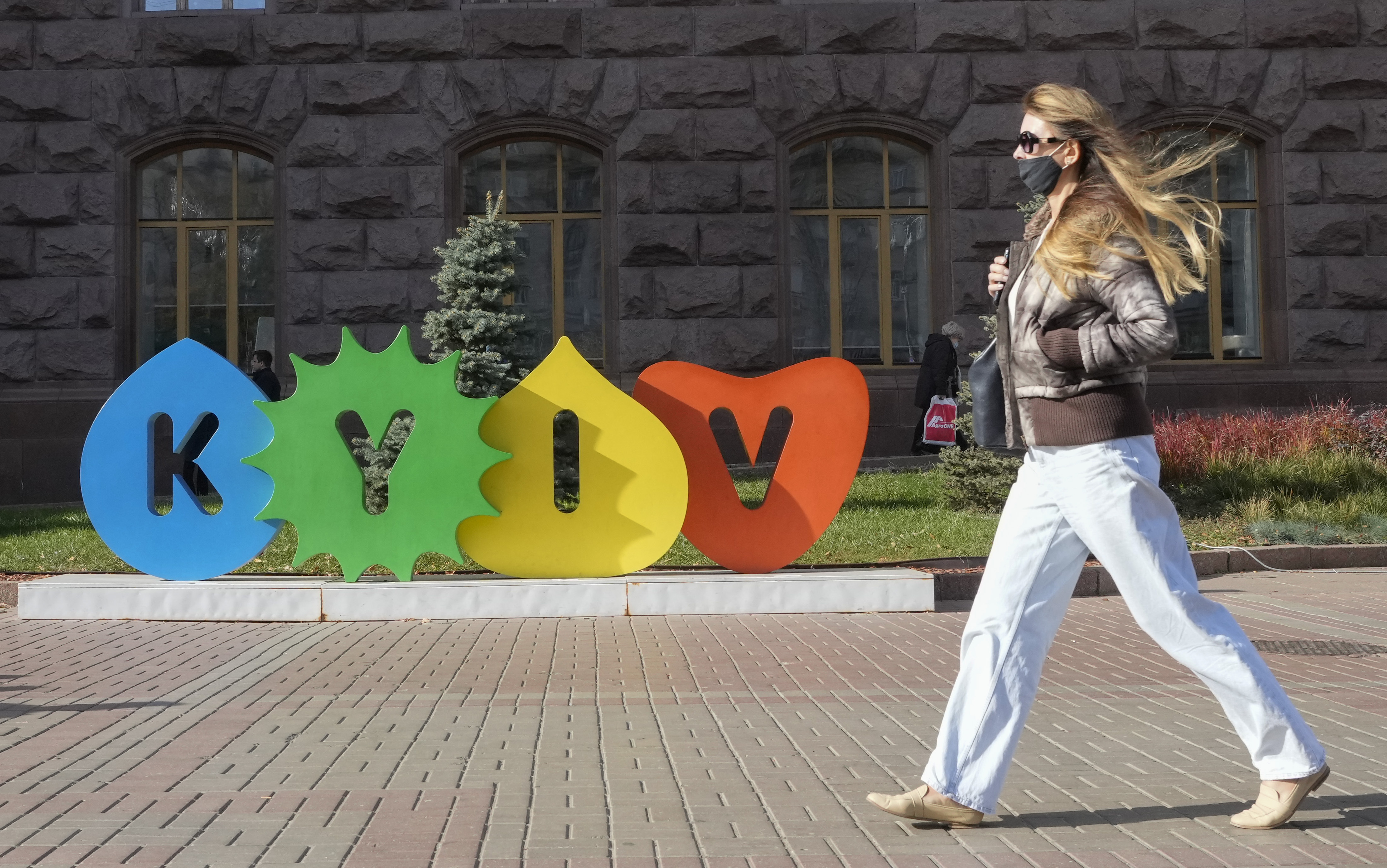 A young woman walks along Kyiv's main Khreschatyk Street
