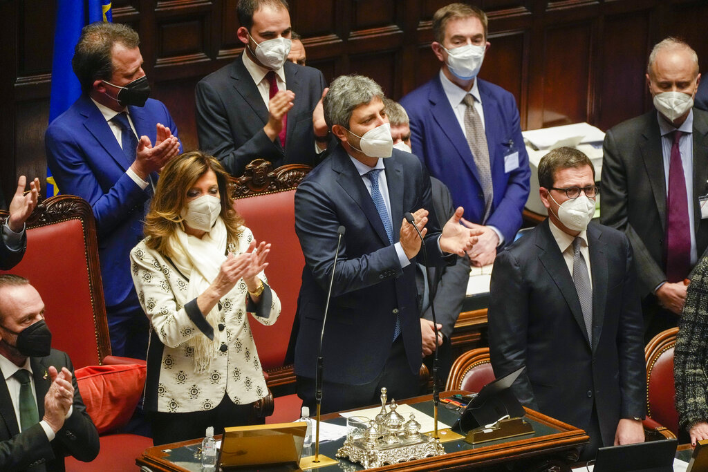 Italian lawmakers in parliament give a standing ovation