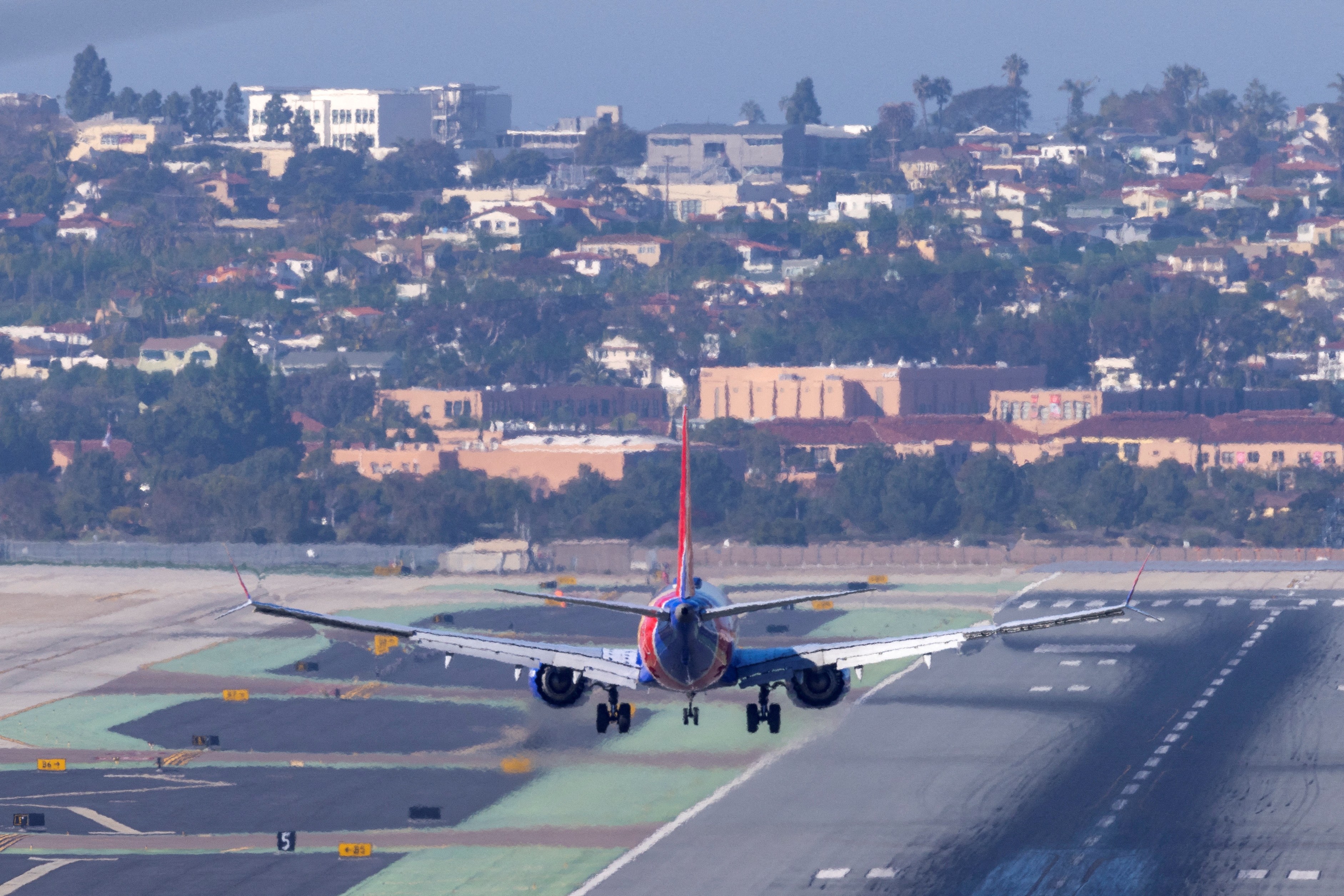 A Southwest Airlines plane approaches to land at San Diego International Airport 