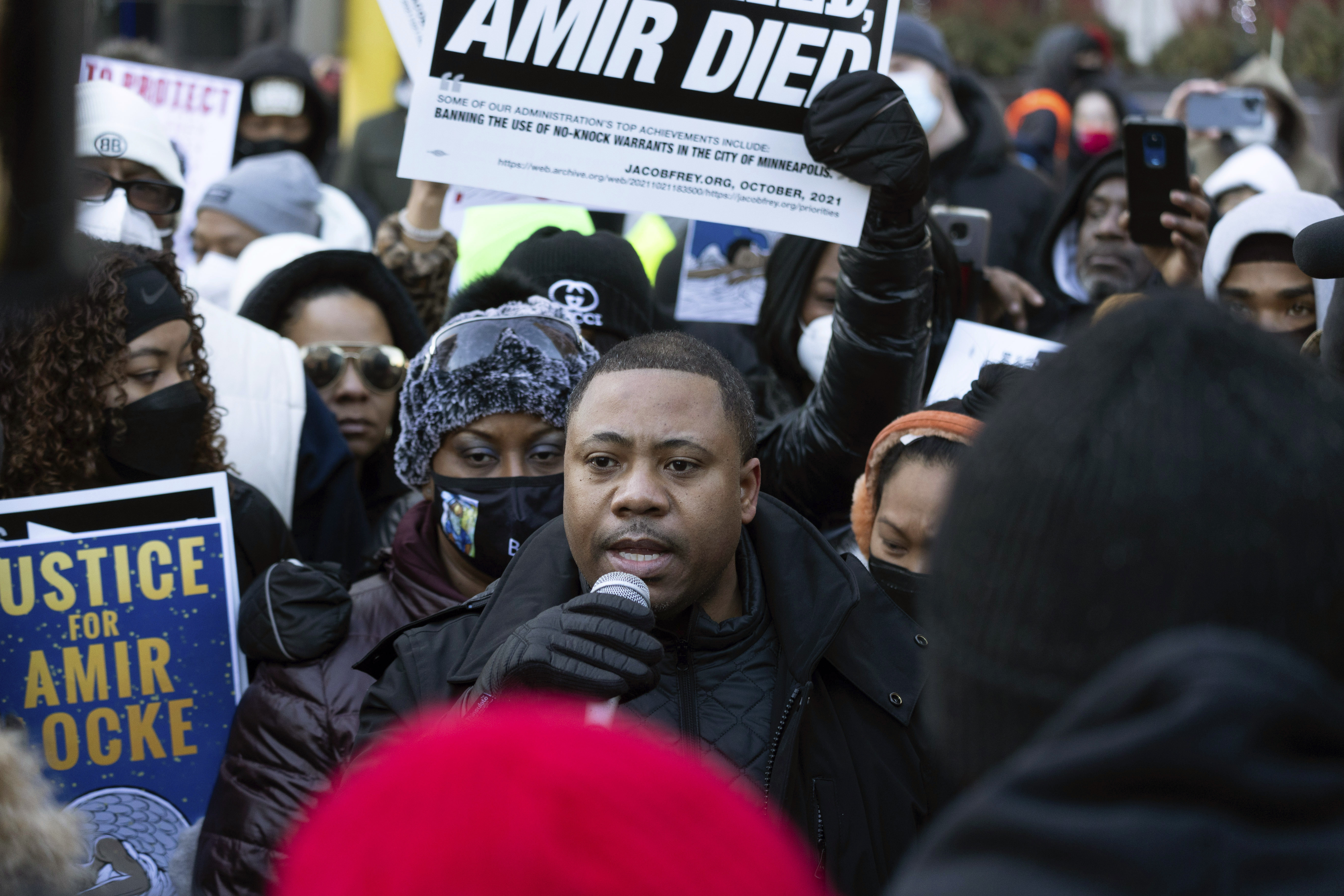 Andre Locke, the father of Amir Locke, speaks at a rally for his son 