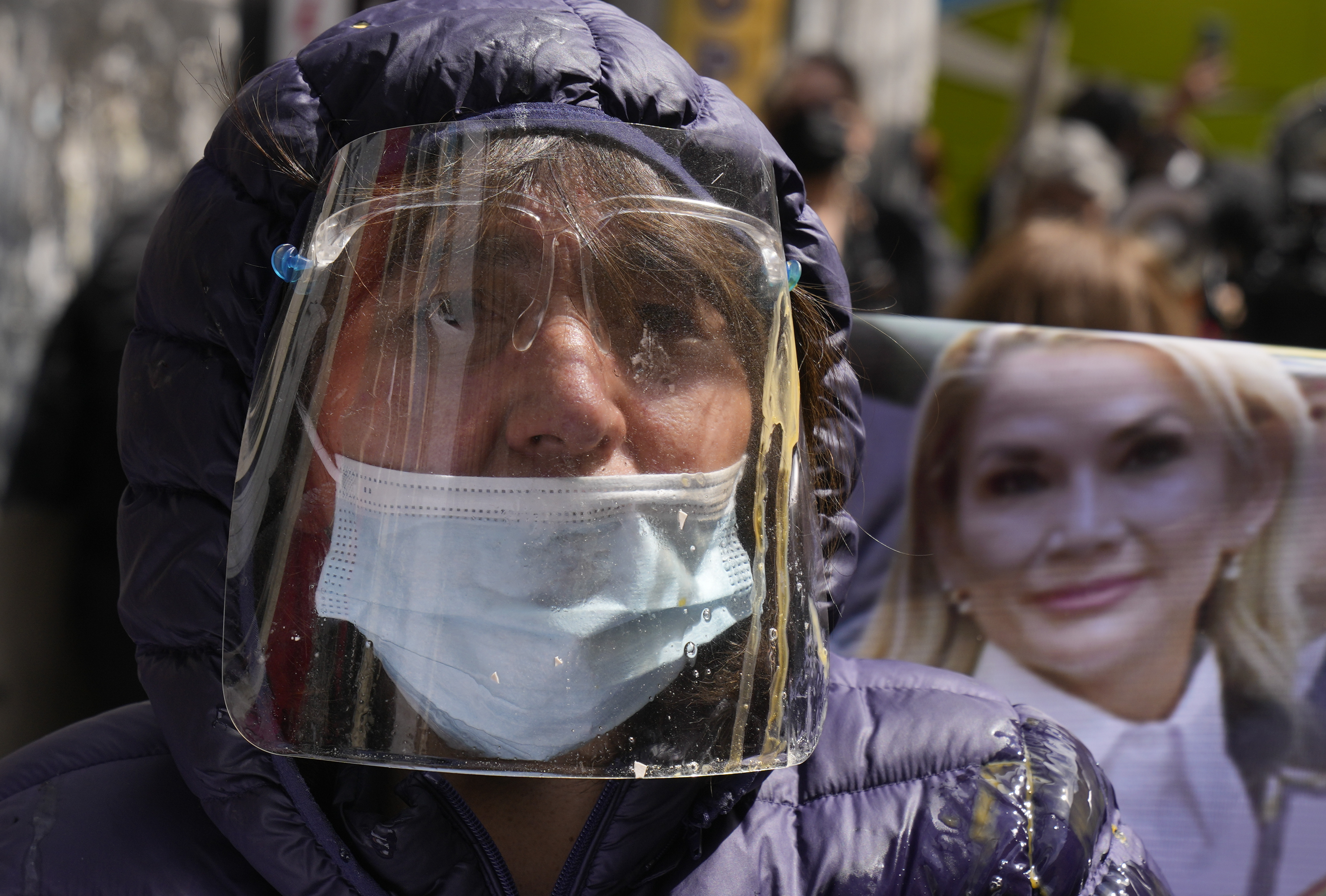 woman wearing face shield