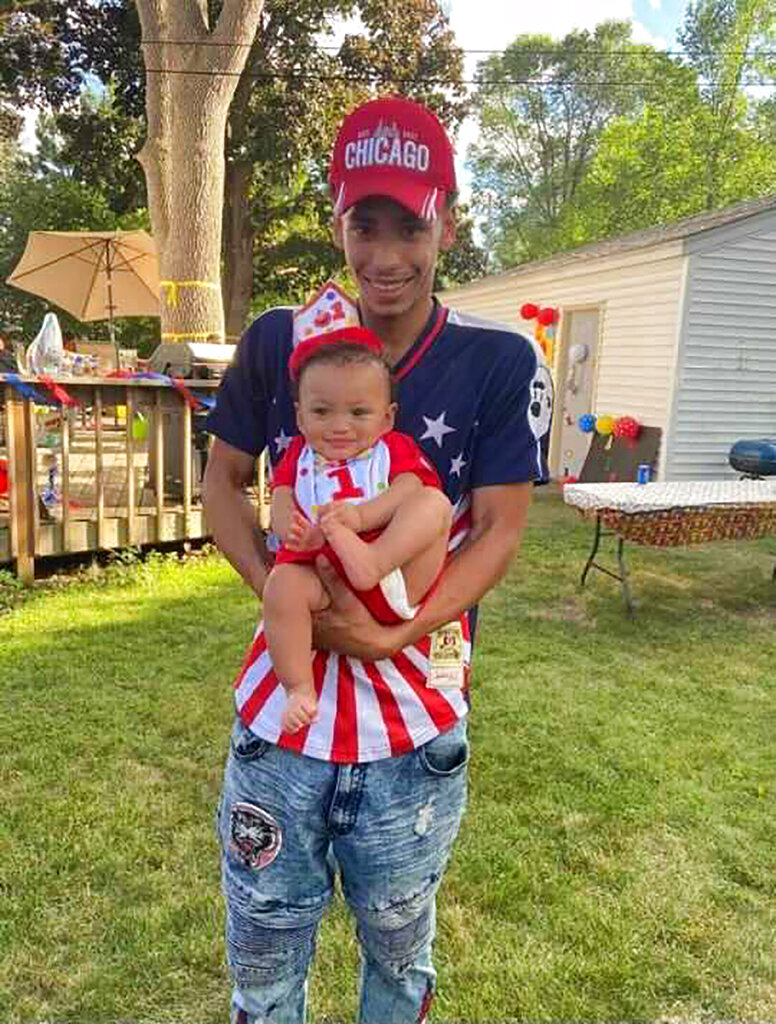 Daunte Wright and his son, Daunte Jr., at his first birthday party. 