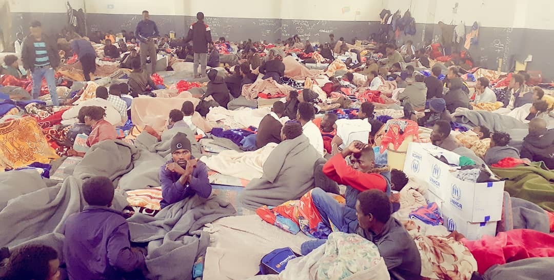 Asylum-seekers crammed in one room in the detention centre of Ain Zara in Tripoli, Libya.