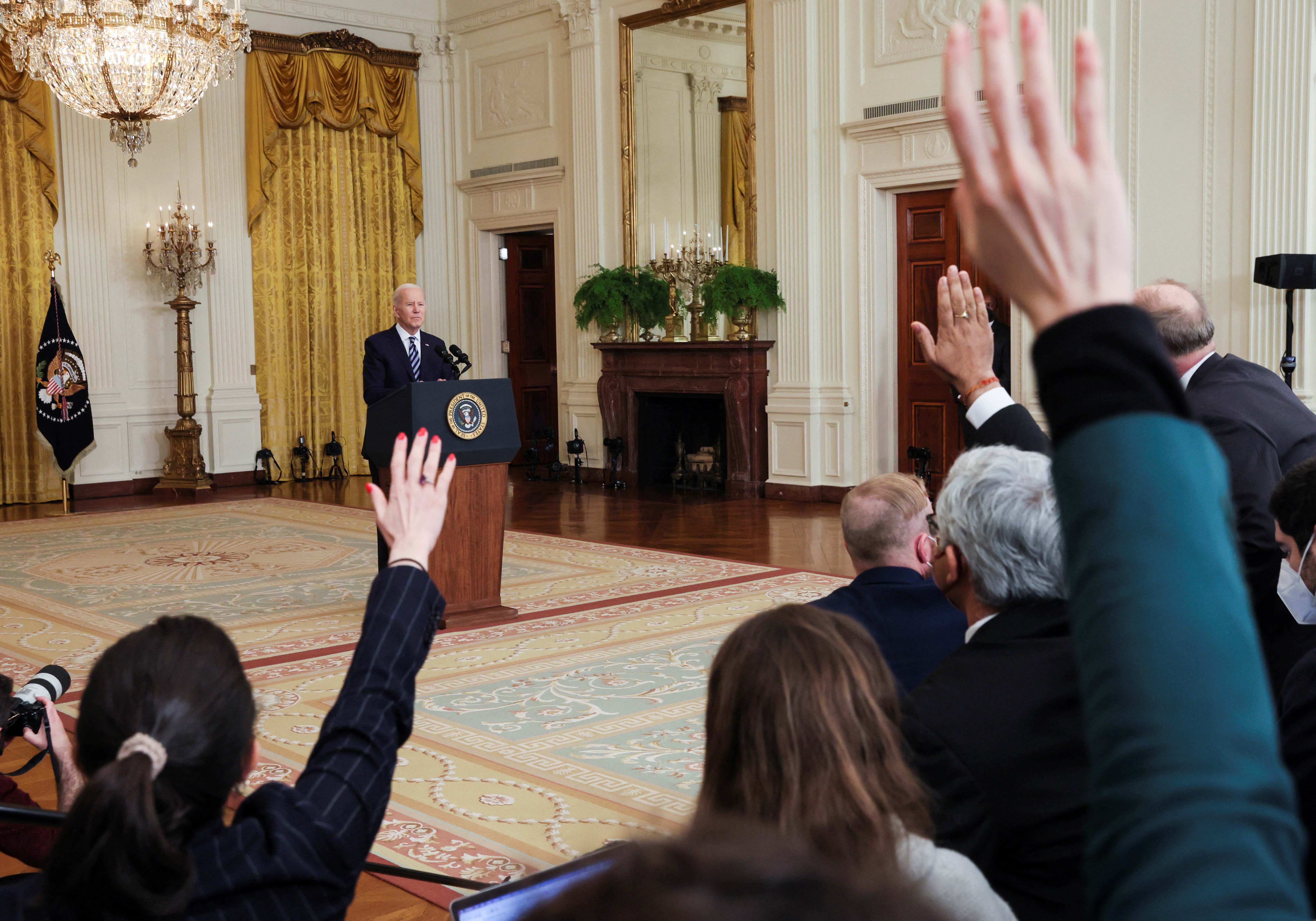 US President Joe Biden takes questions while delivering remarks on Russia's attack on Ukraine.