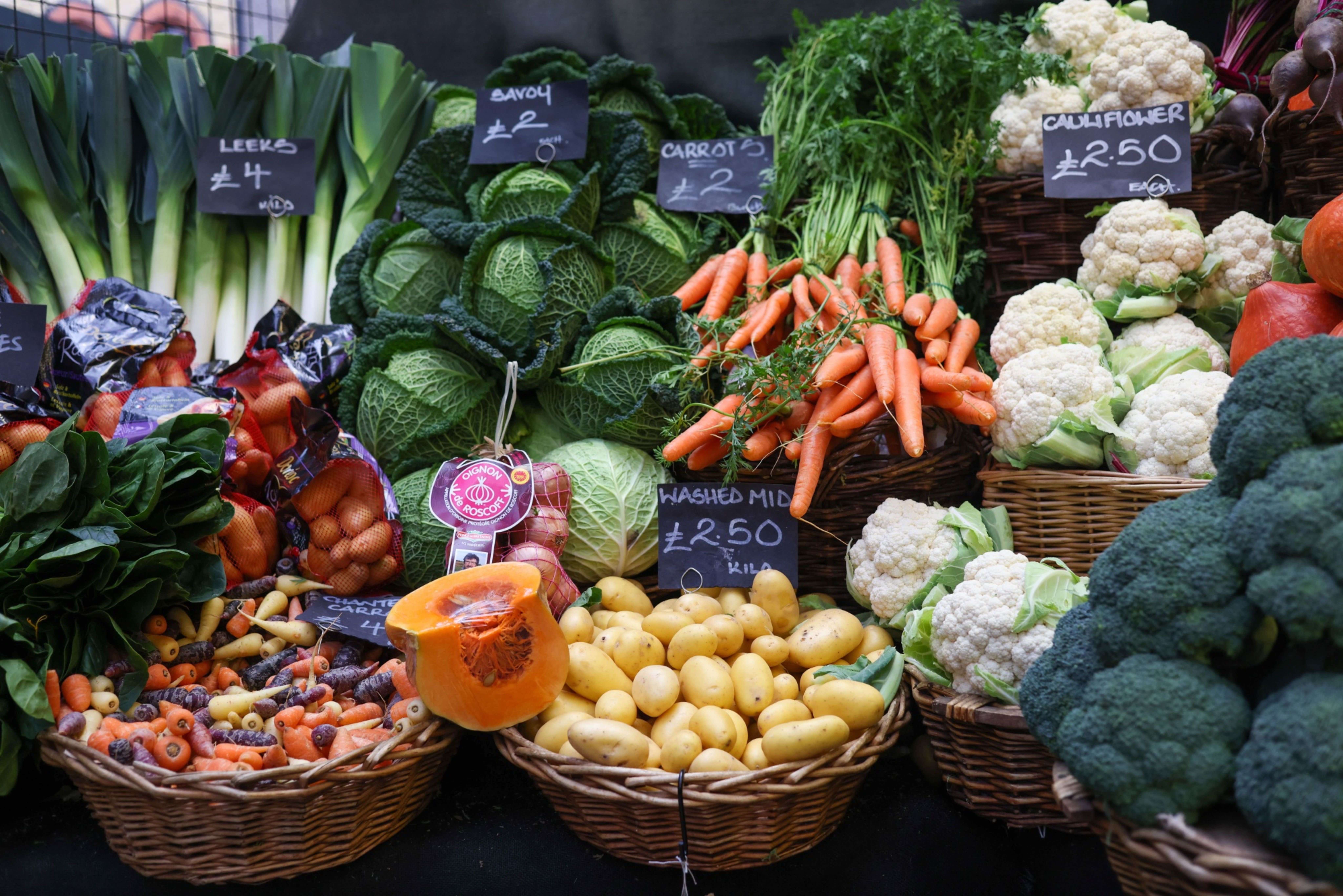 Leeks, savoy, cauliflower and carrots for sale at Borough Market in London, U.K