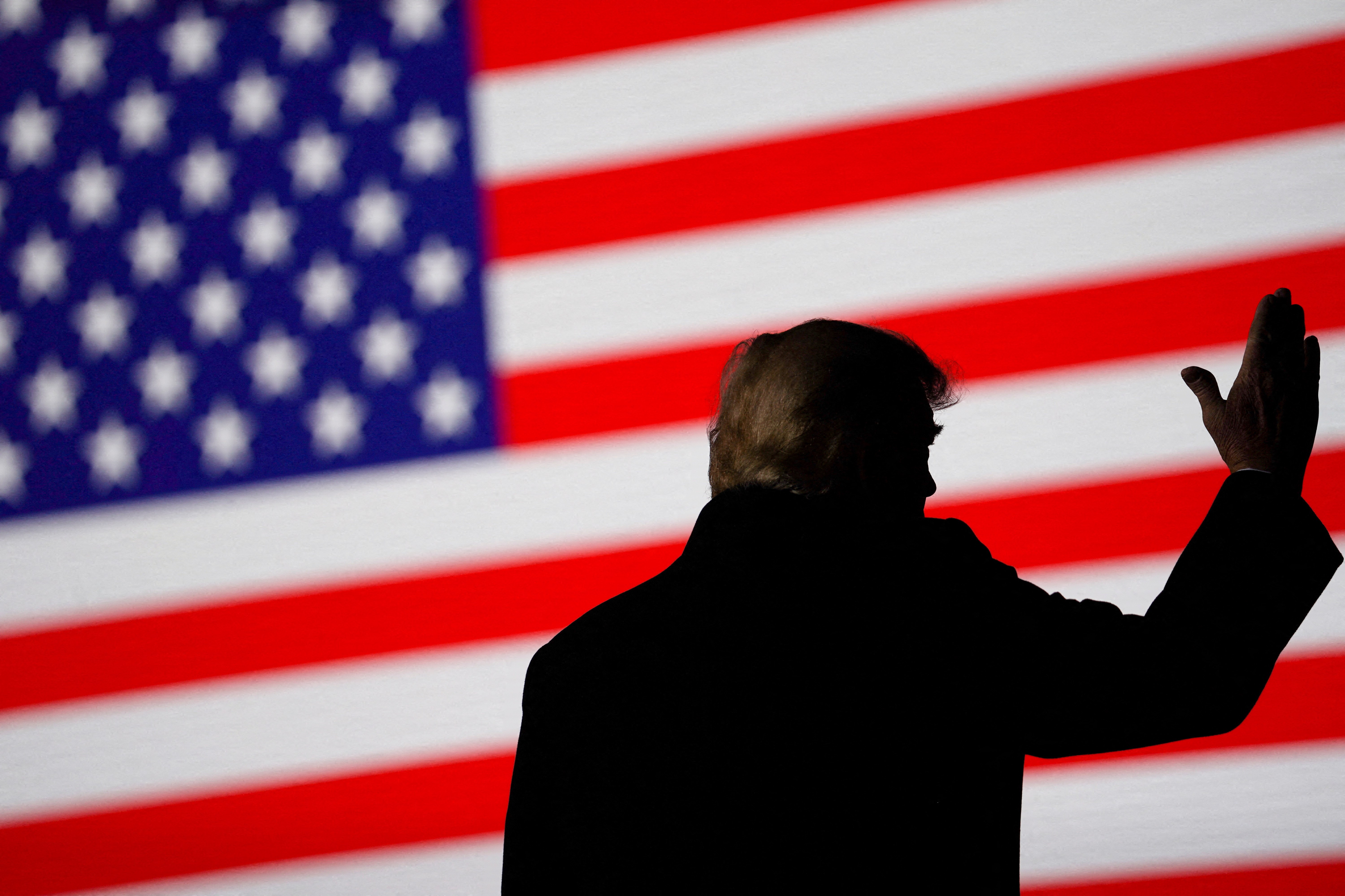 Former US President Donald Trump gestures during a rally in Conroe, Texas, US