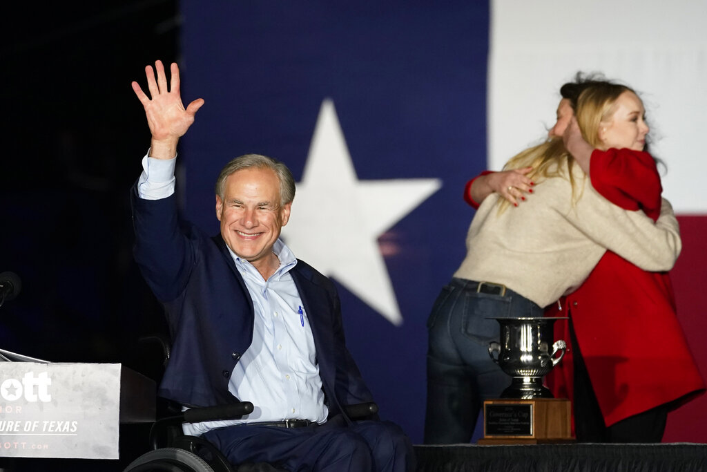 Texas Governor Greg Abbott, with his wife Cecilia and daughter Audrey, arrive for a primary election night event, in Corpus Christi, Texas. 