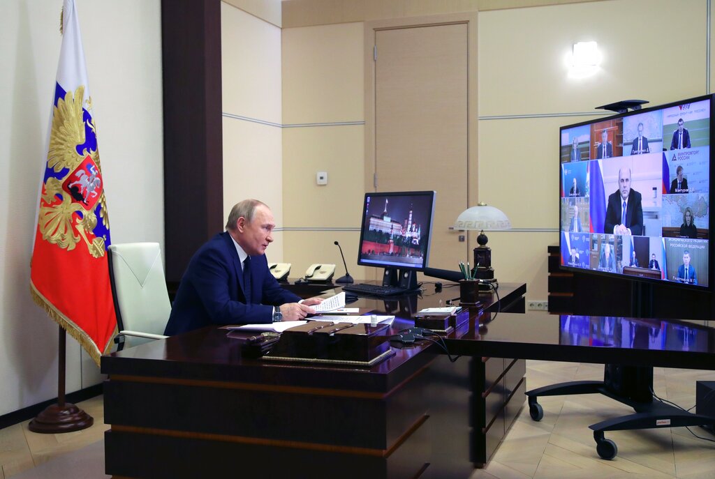 Russian President Vladimir Putin attends a cabinet meeting via videoconference at the Novo-Ogaryovo residence outside Moscow.
