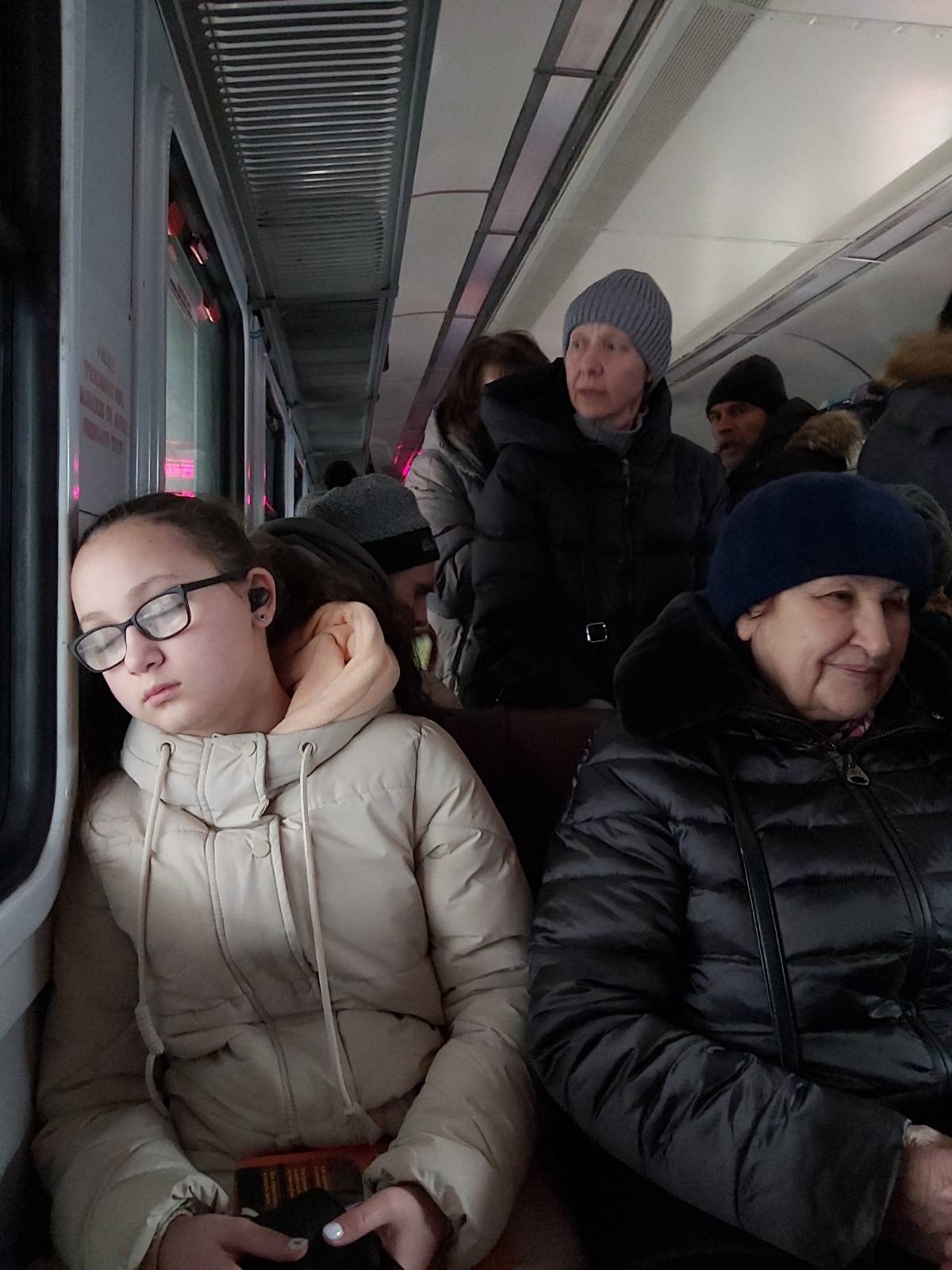 Zakhida's daughter and mother on a train from Kyiv to Lviv