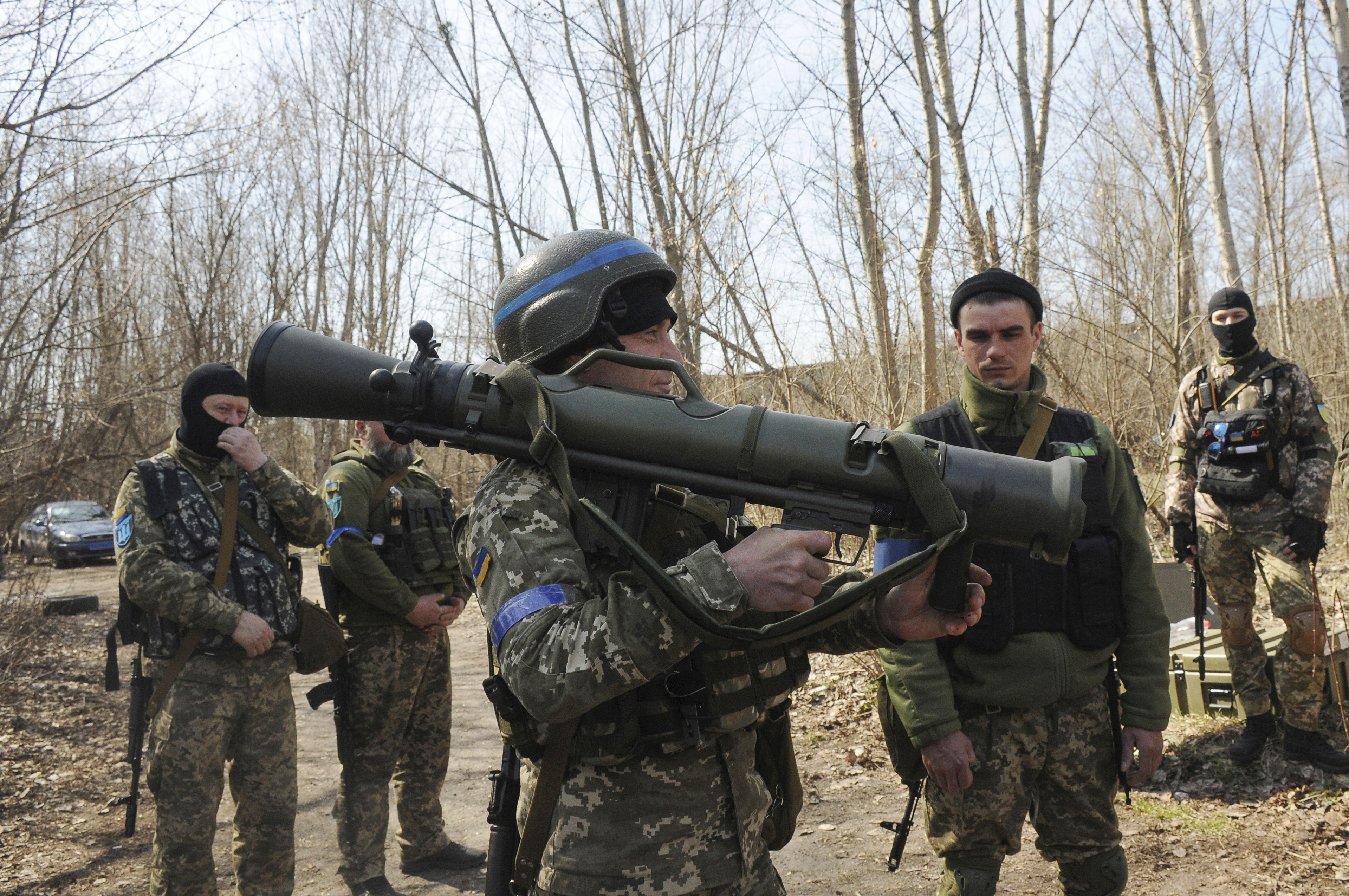  Ukrainian servicemen study a Sweden shoulder-launched weapon system Carl Gustaf M4 during a training session on the near Kharkiv, Ukraine, April 7, 2022. Western weaponry pouring into Ukraine helped blunt Russia's initial offensive and seems certain to play a central role in the approaching battle for Ukraine's contested Donbas region. Yet the Russian military is making little headway halting what has become a historic arms express. 