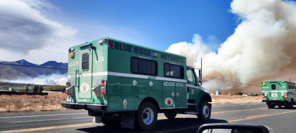 Wildfire firefighters known as 'hot shots' rushed to contain the 'Tunnel Fire' in Arizona.