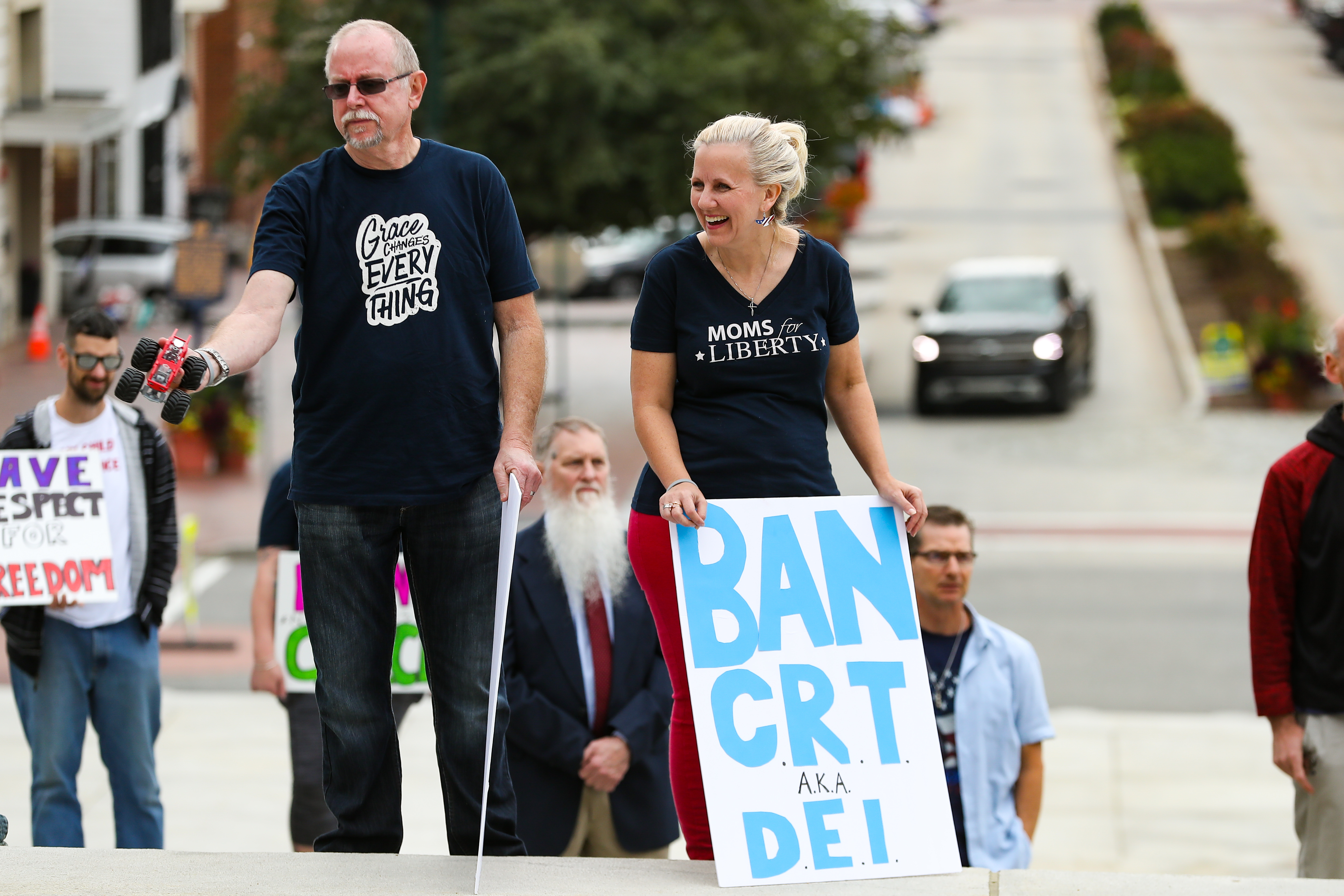 Protester holds placard that reads "Ban CRT (critical race theory)