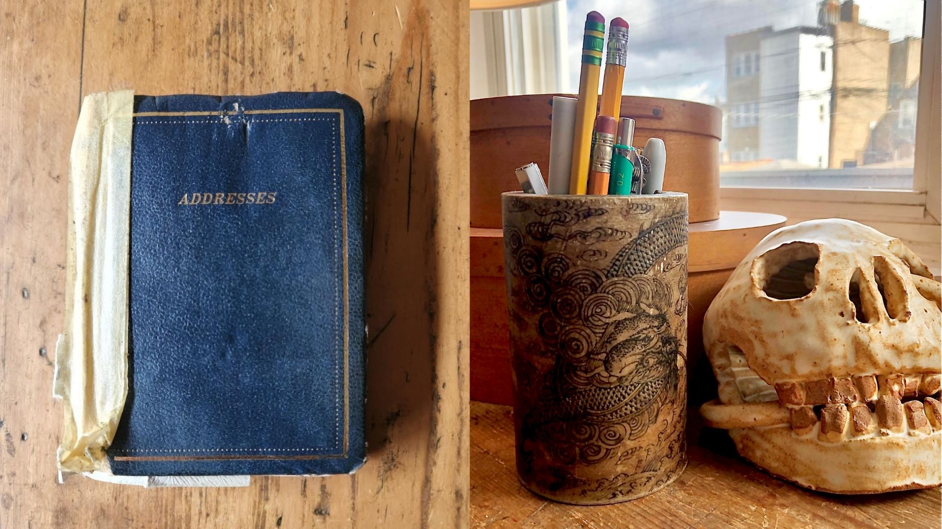 An address book, and a jar with pens