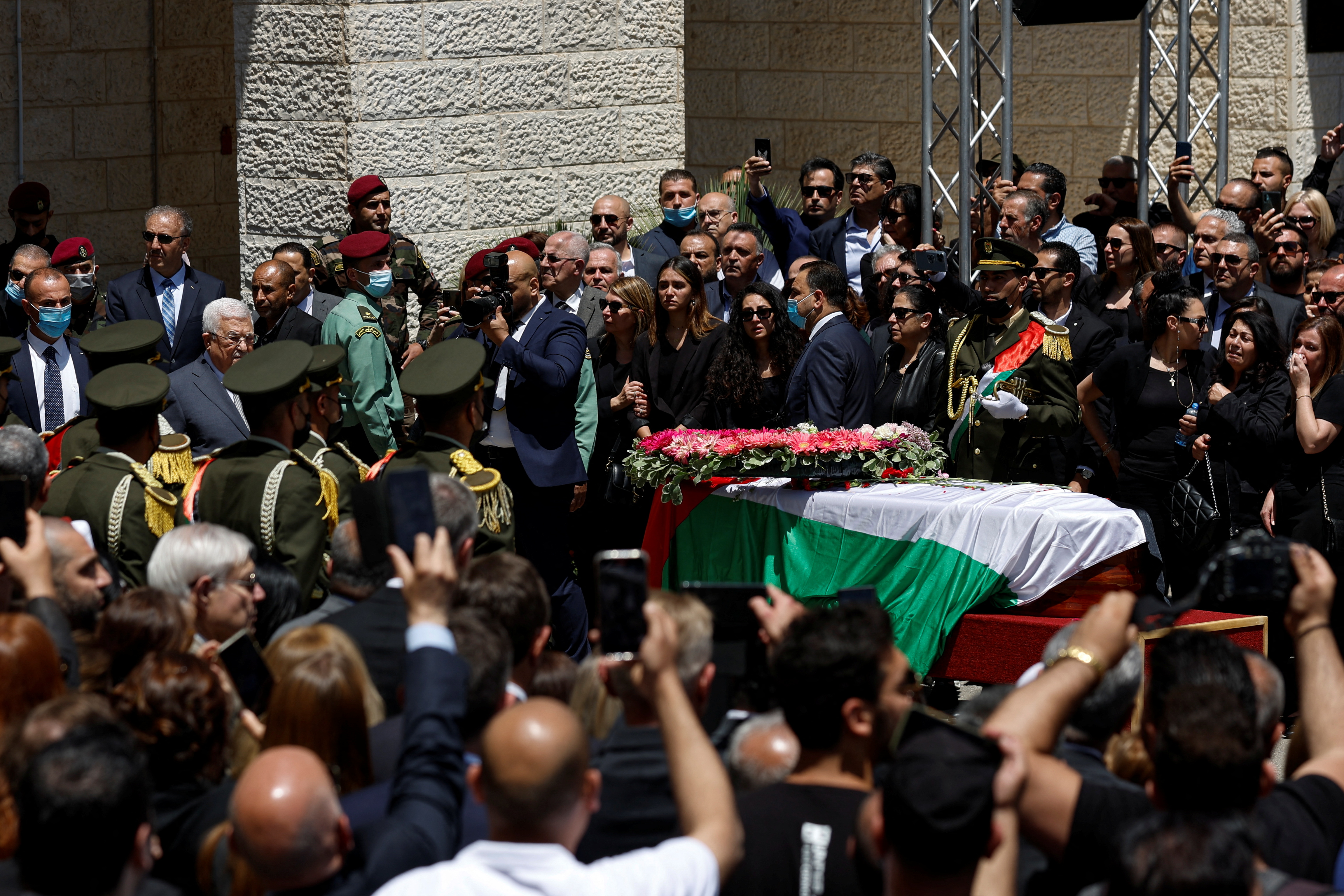 Palestinians attend a state service for veteran Al-Jazeera journalist Shireen Abu Akleh