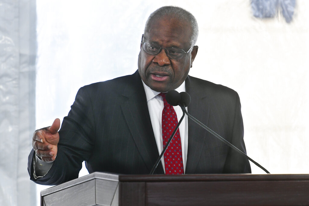 Supreme Court Justice Clarence Thomas delivers a keynote speech during a dedication of Georgia's new Nathan Deal Judicial Center in Atlanta.
