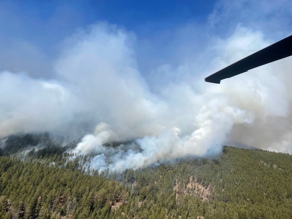 Thousands of firefighters and National Guard troops are battling destructive wildfires in the Southwest as more residents are preparing to evacuate. 