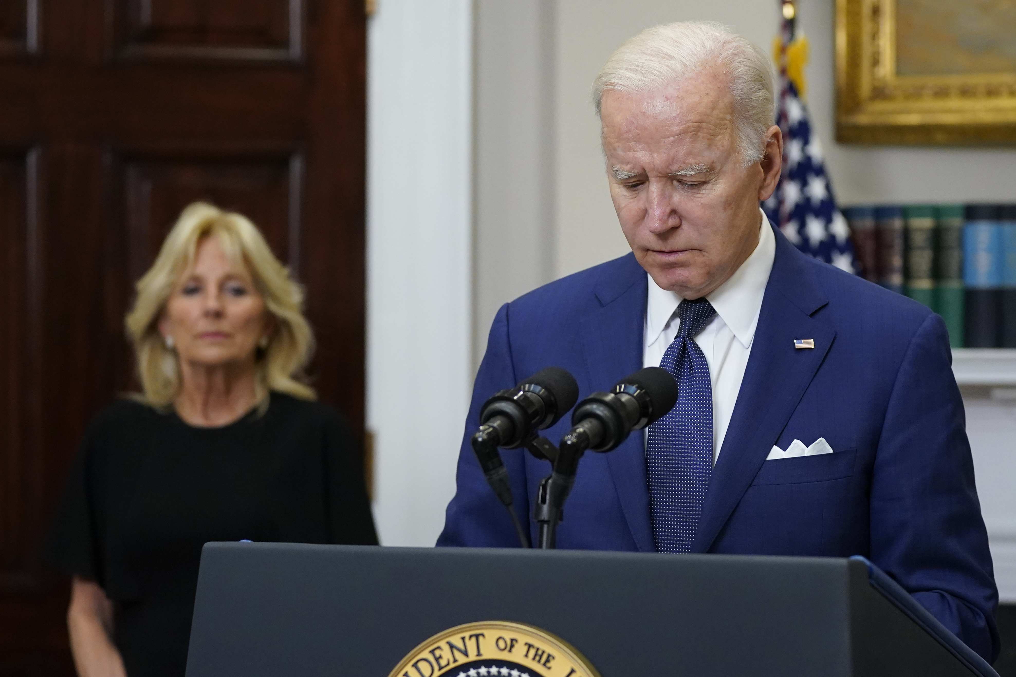 US president Joe Biden addresses the nation with his wife behind him