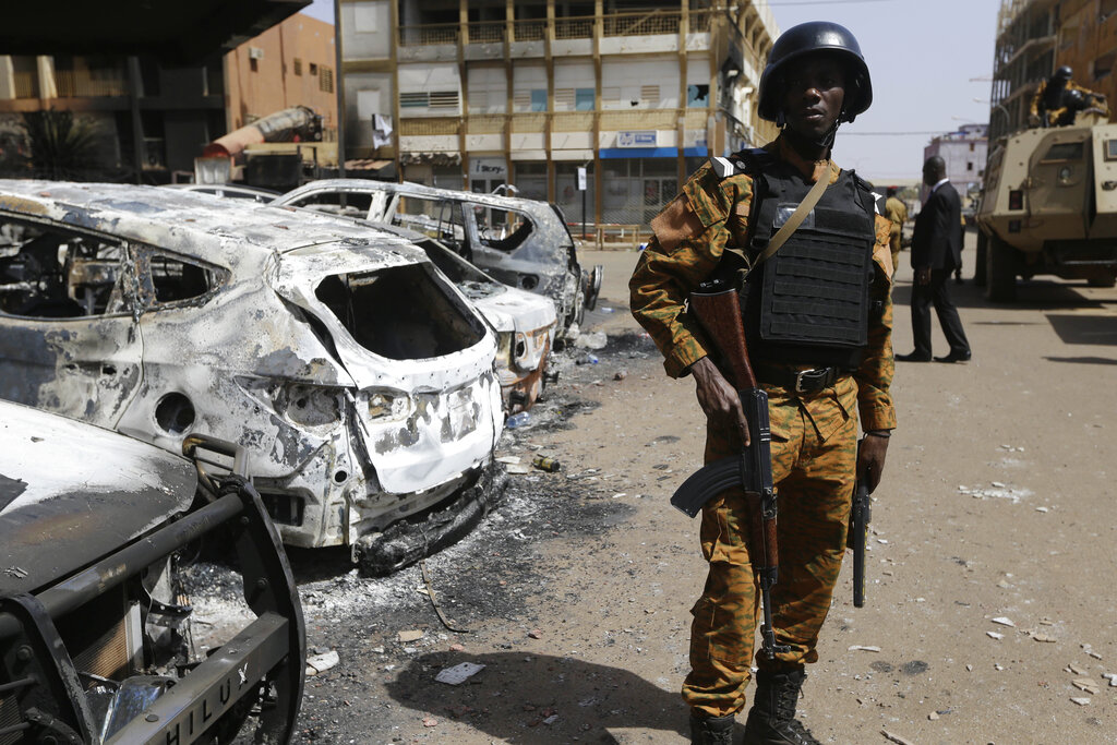 A soldier stands guard outside the Splendid Hotel in Ouagadougou, Burkina Faso in 2016
