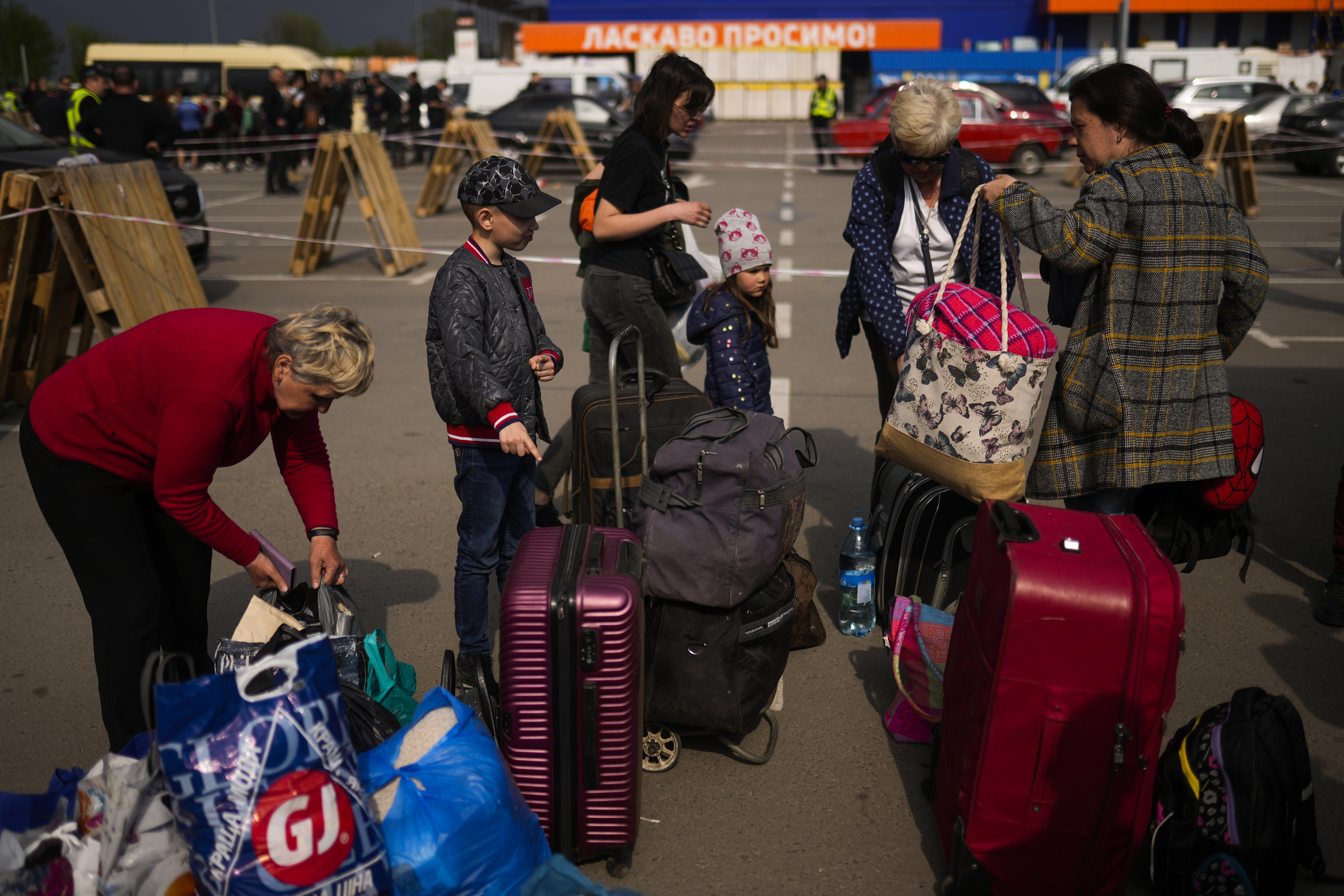People arrive at a reception centre for displaced people in Zaporizhzhia.